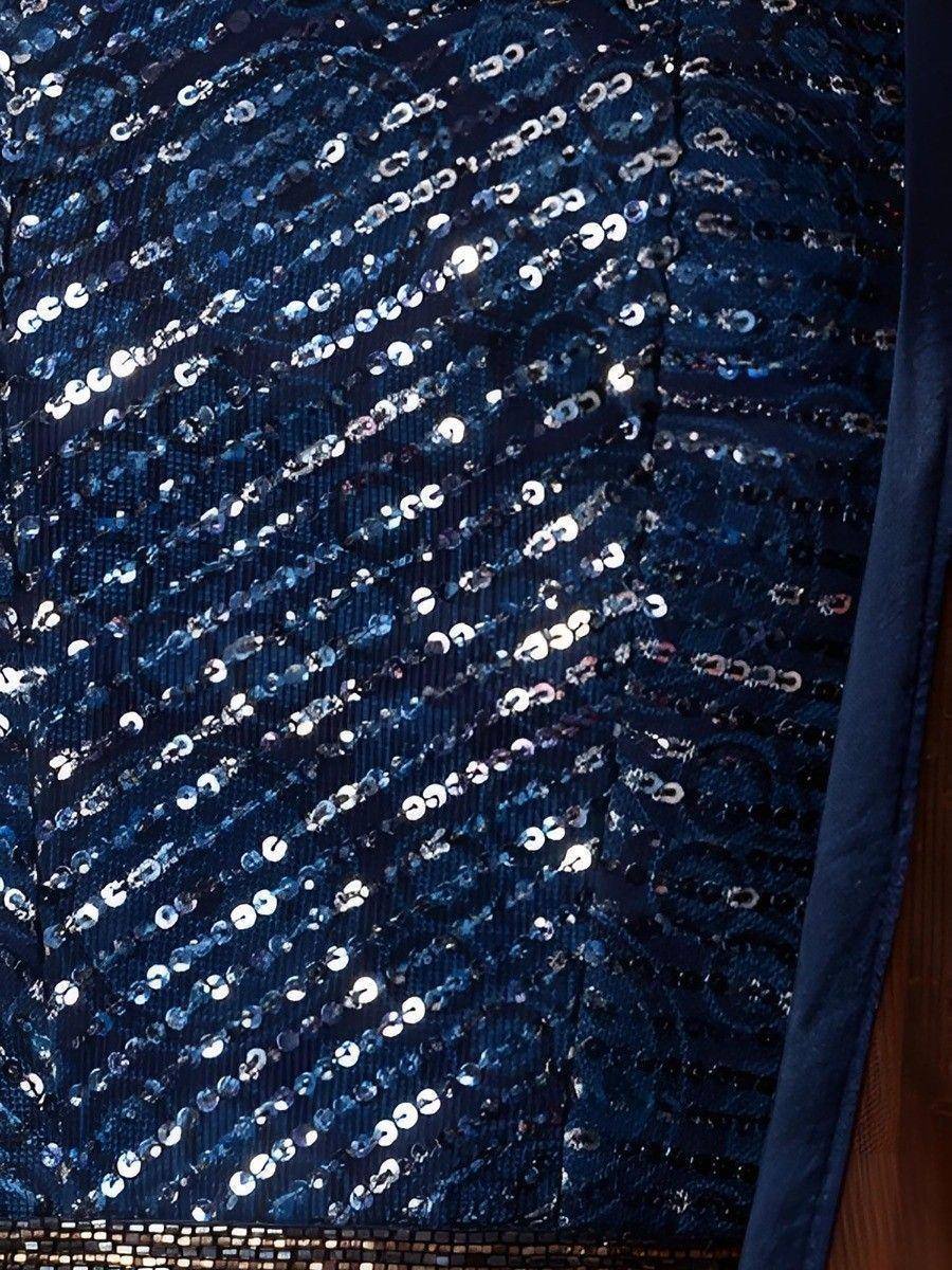 Navy blue sequin ethnic gown with shimmering diagonal pattern, perfect for festive occasions.