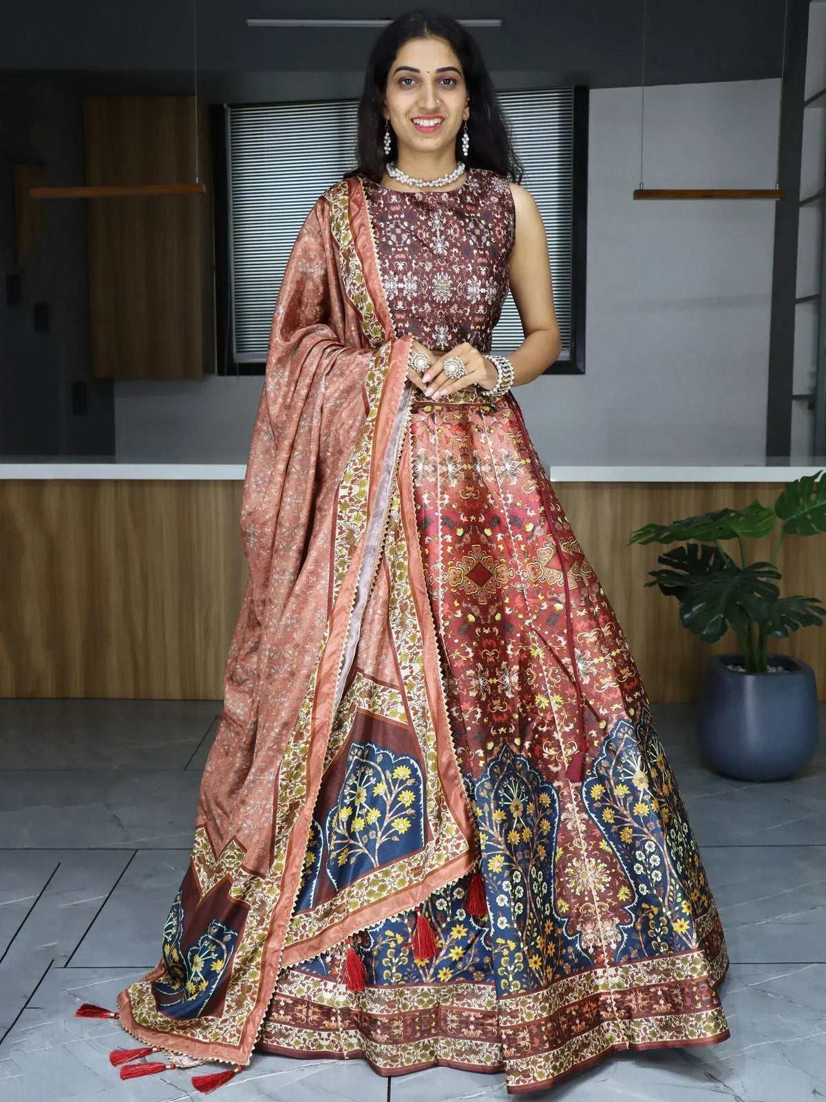 Woman in elegant Indian lehenga choli with floral print, perfect for weddings or festive occasions.