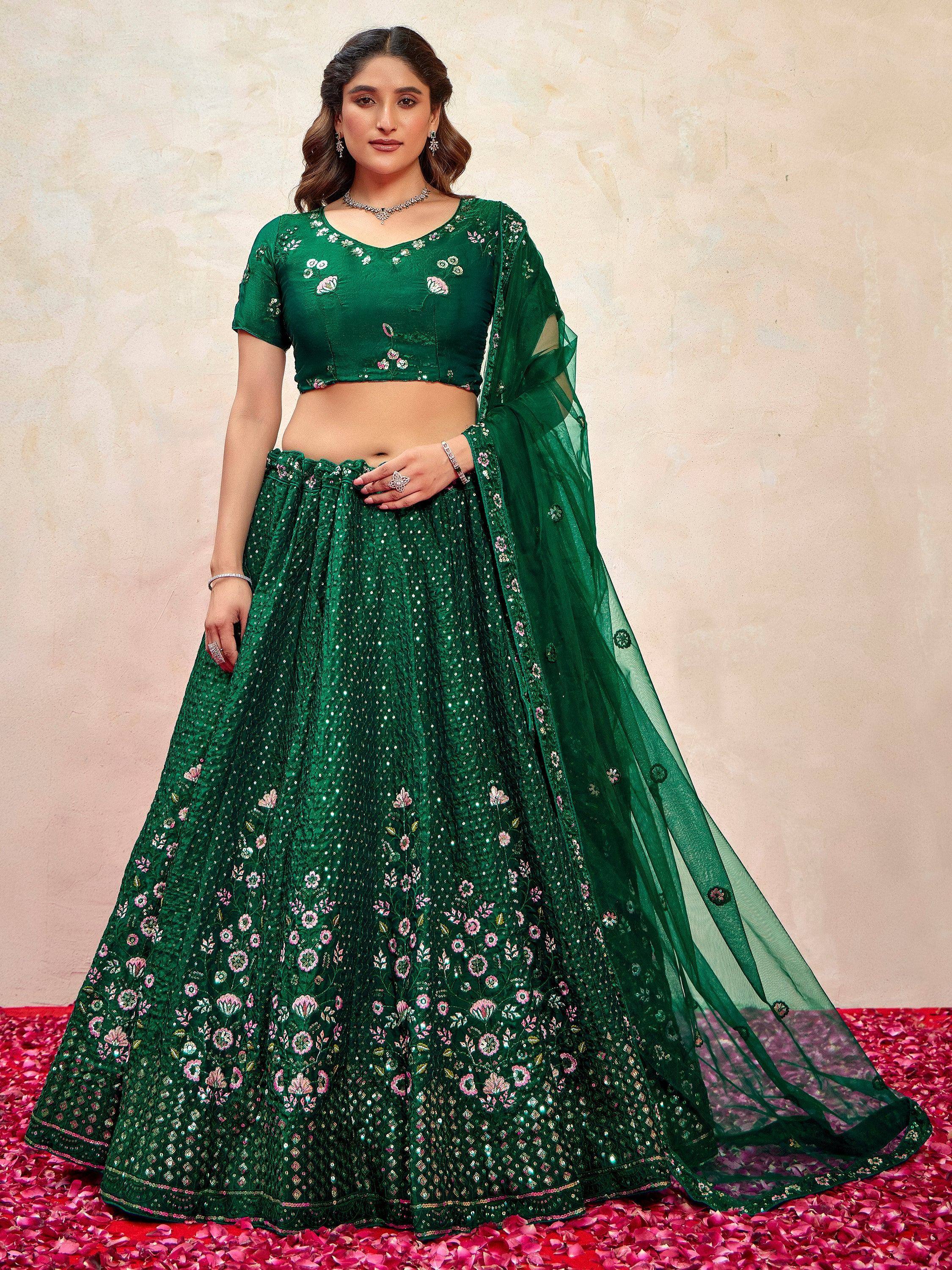 Emerald green lehenga choli with floral embroidery and sequins, perfect for Indian weddings and festive occasions.