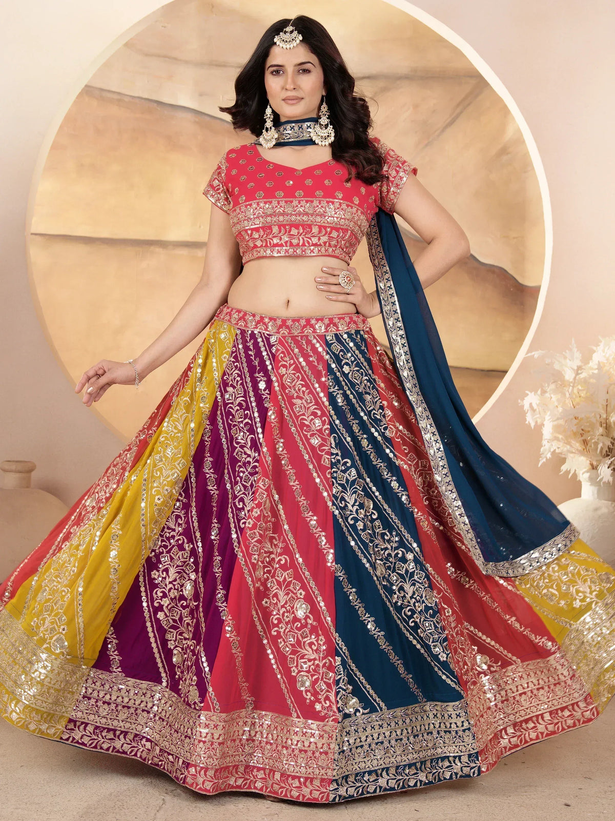 Multicolor embroidered lehenga choli with gold detailing, perfect for Indian ethnic wear and festive occasions