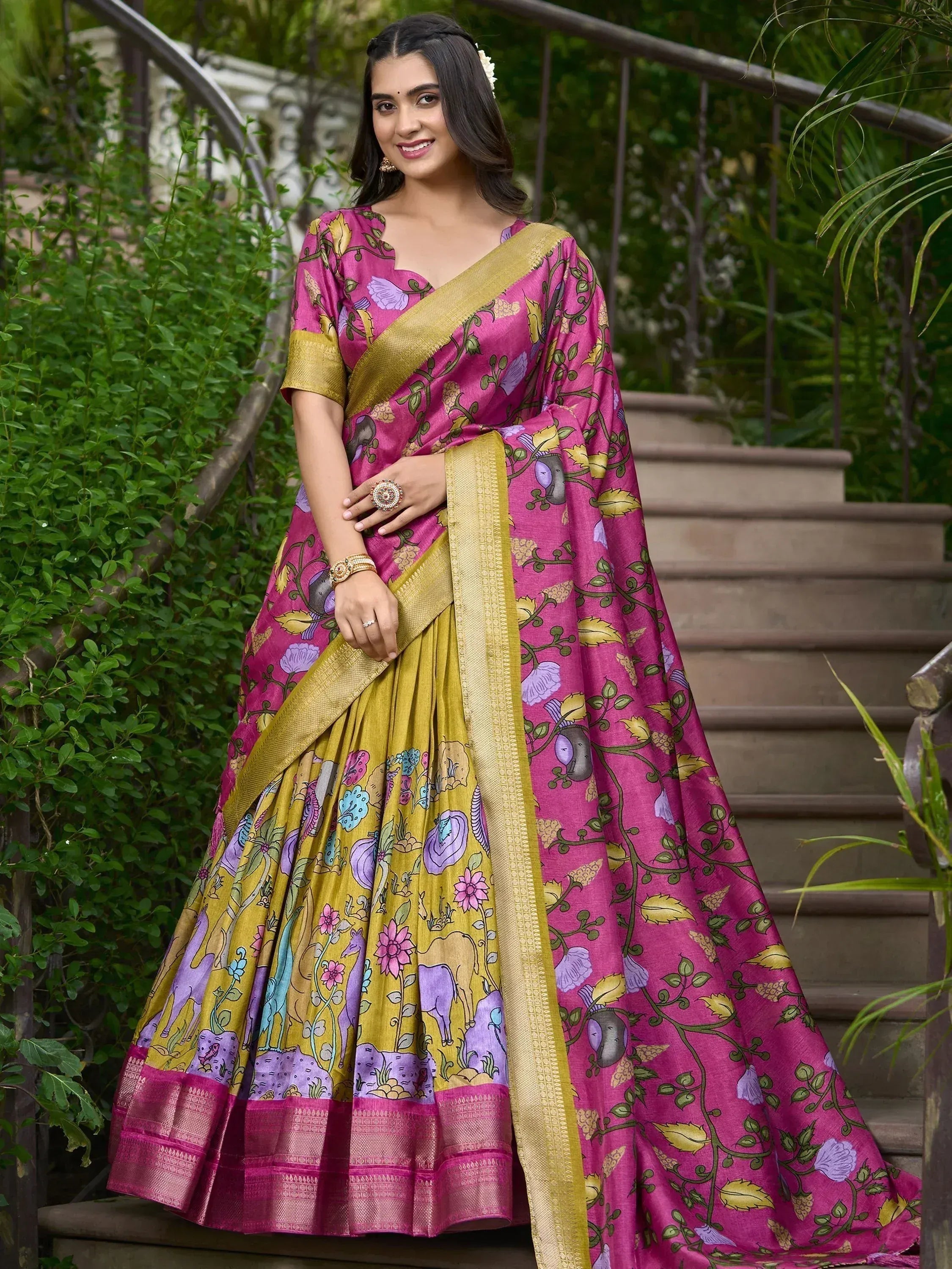 Pink and gold printed saree with floral and animal motifs, perfect for Indian ethnic wear occasions
