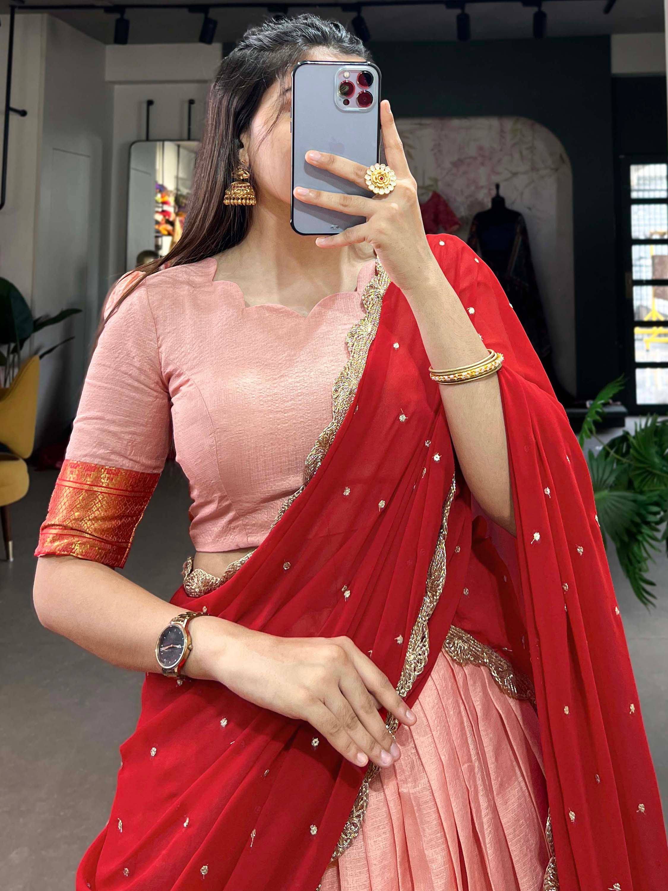 Red saree with gold embroidery paired with pink blouse, perfect for Indian ethnic wear occasions