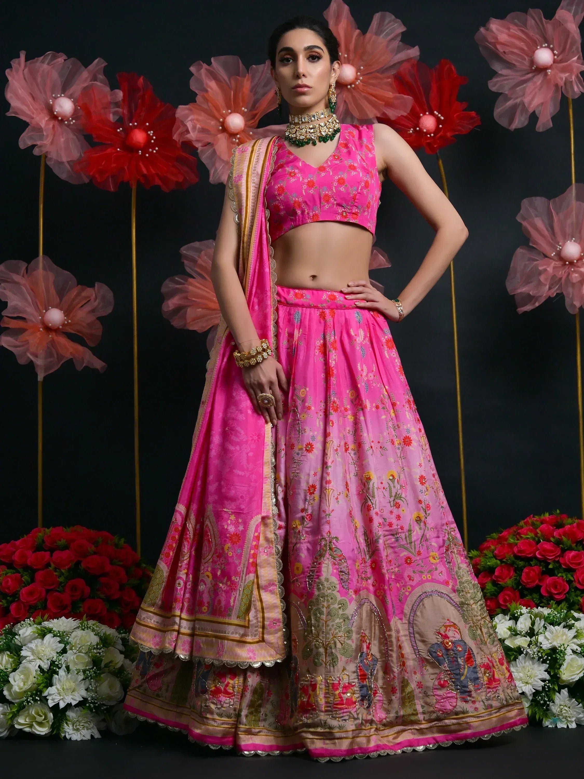 Pink floral lehenga choli with embroidered motifs, perfect for Indian ethnic wear and festive occasions.
