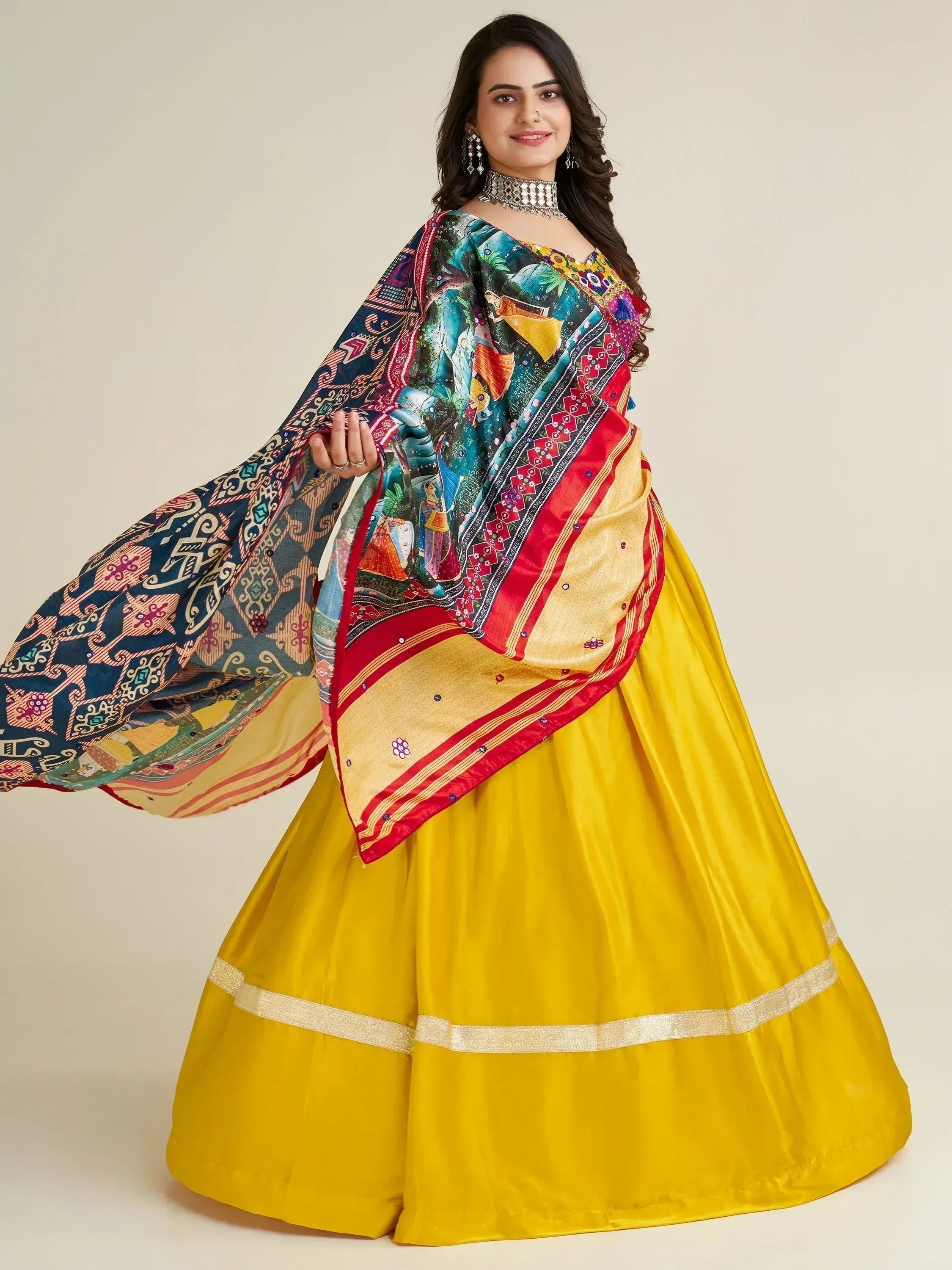 Yellow lehenga choli with colorful printed dupatta, ethnic Indian wear for festive occasions