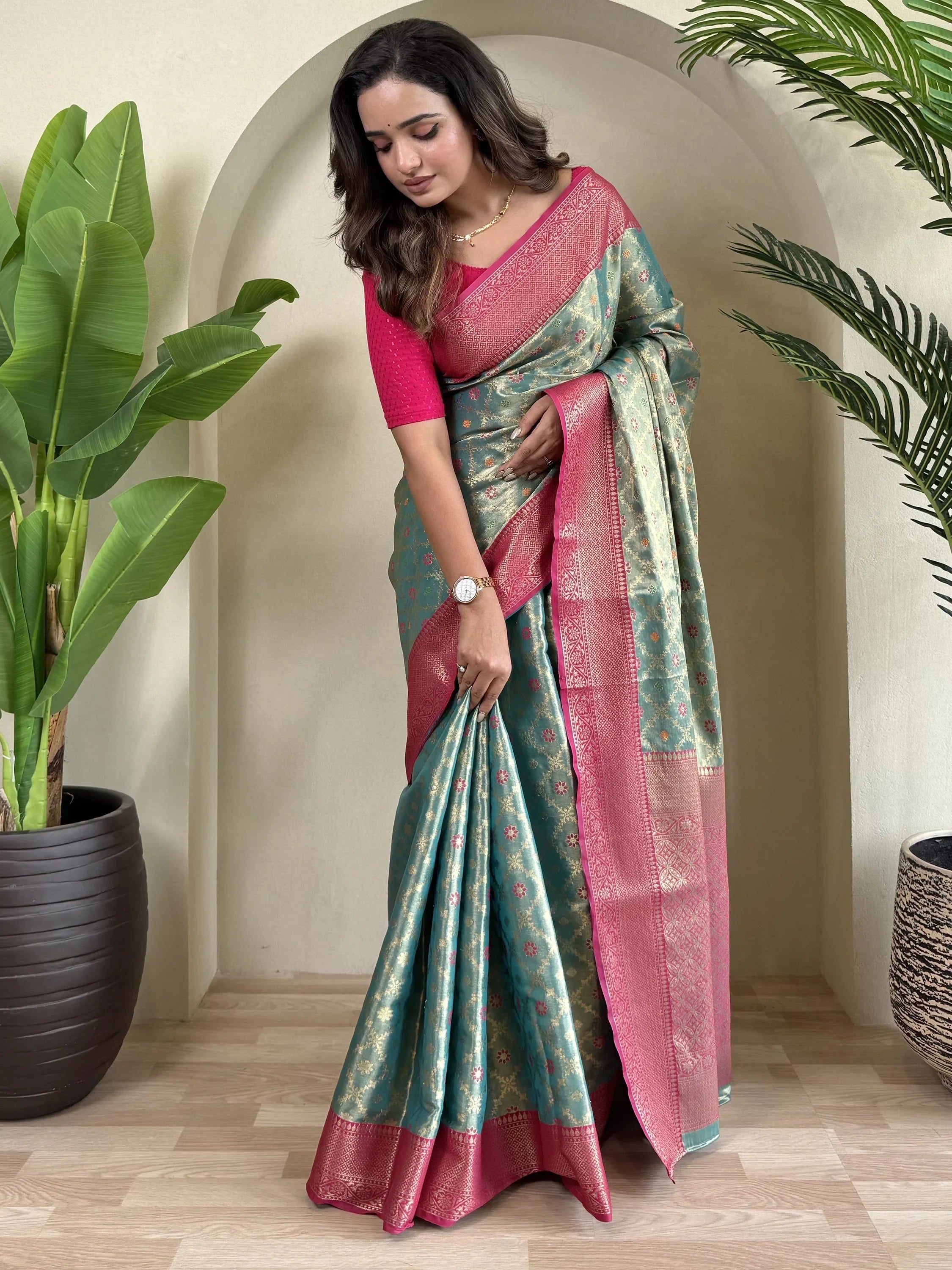 Adorable Teal Blue Zari Weaving Tissue Silk Festival Wear Saree