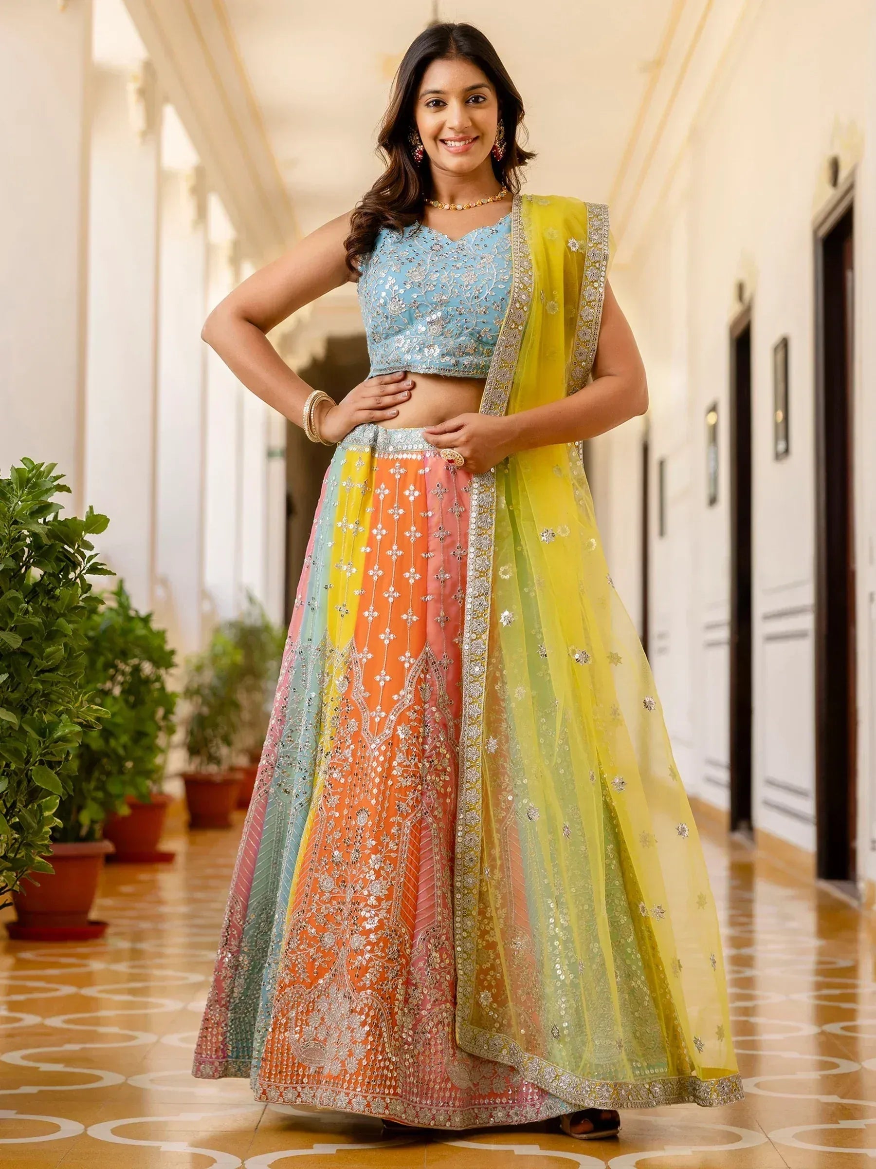 Colorful embroidered lehenga choli with yellow dupatta, perfect for Indian ethnic wear occasions