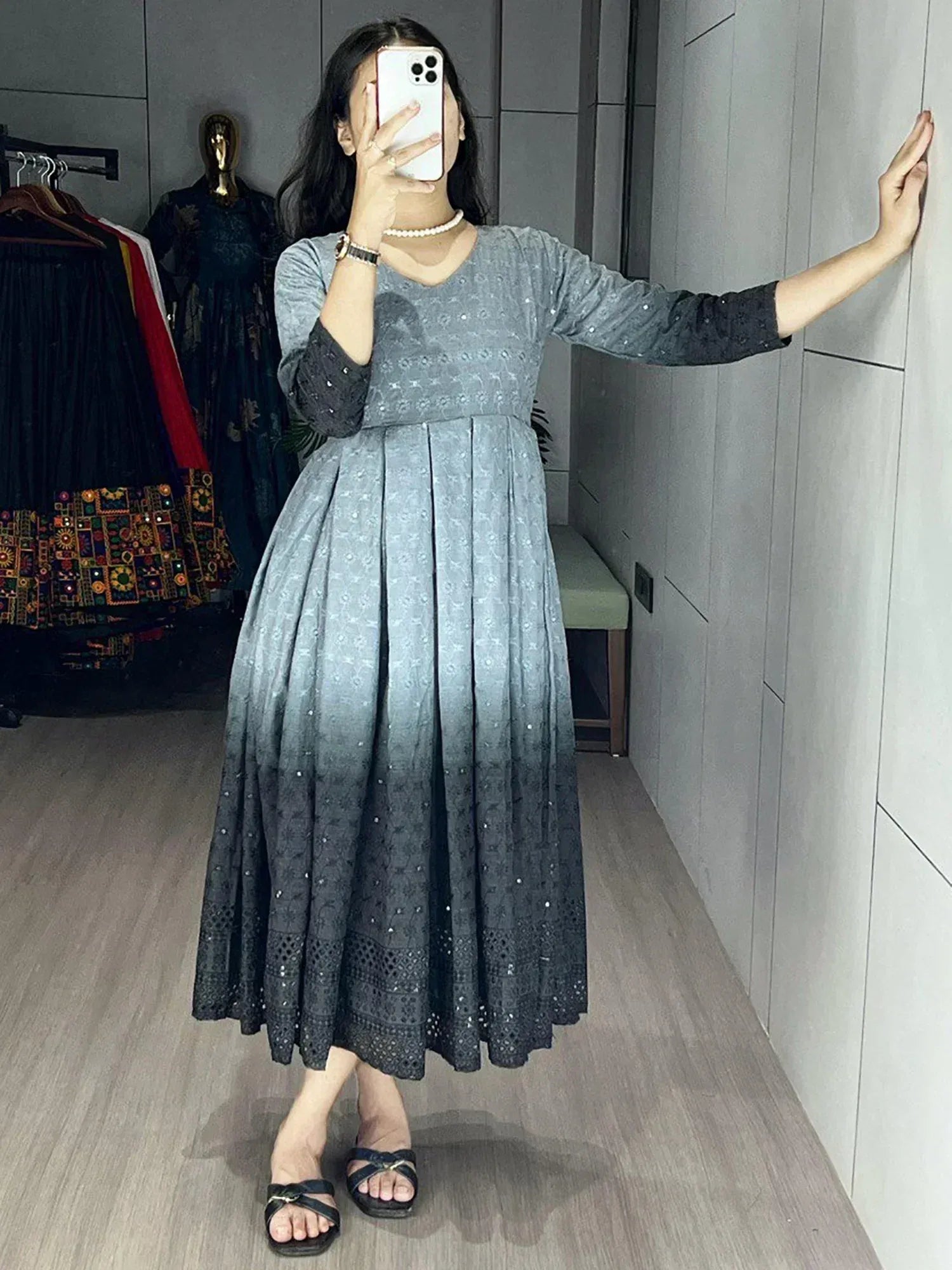 Woman wearing grey ombre ethnic gown with embroidery, perfect for Indian occasions and parties.
