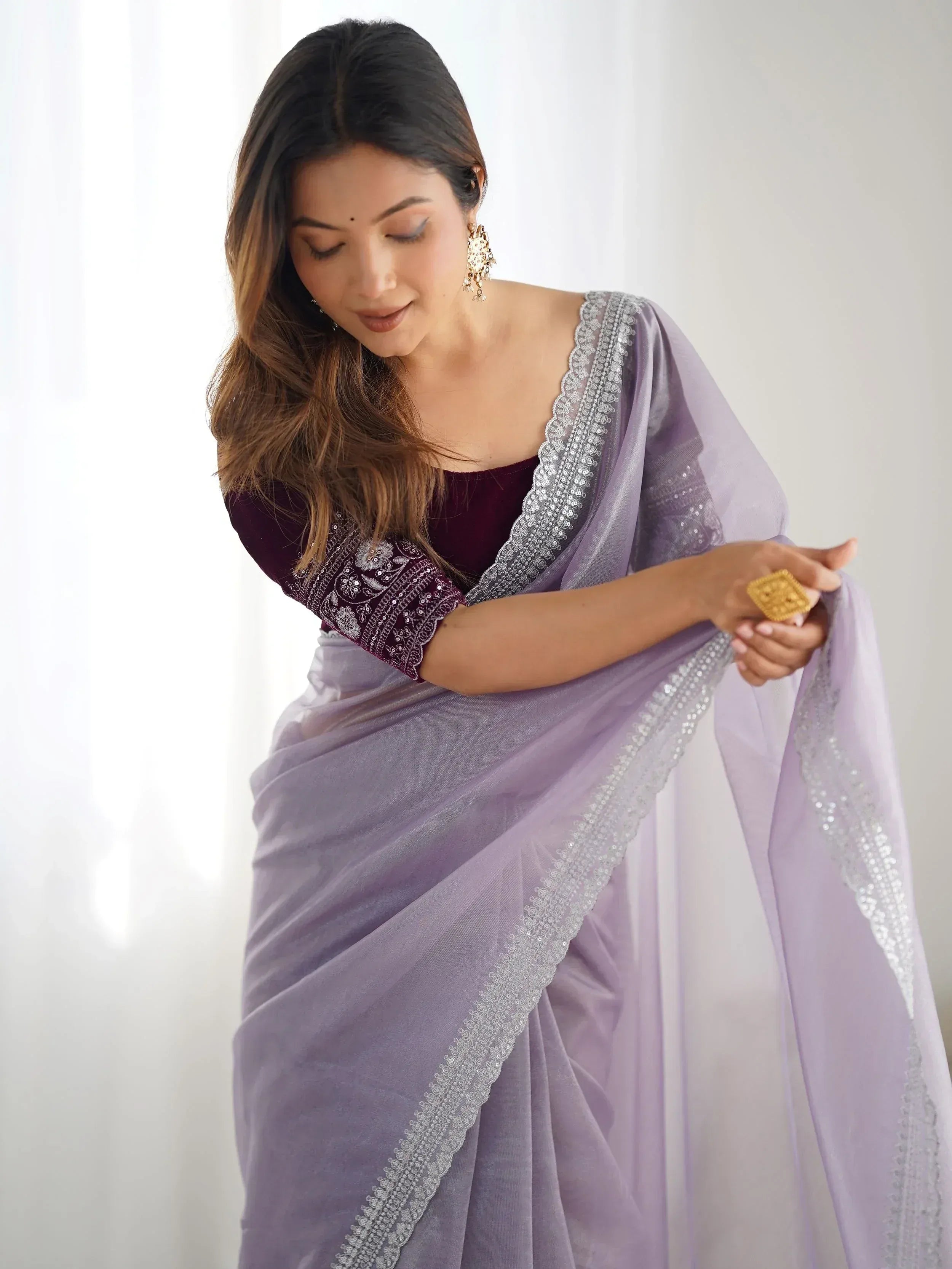 Lavender saree with silver embroidery, paired with maroon blouse, perfect for Indian ethnic occasions