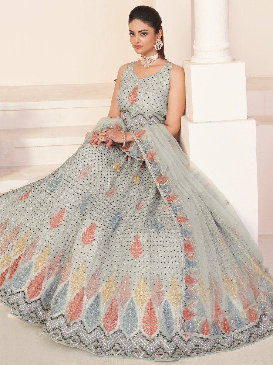 Elegant grey lehenga choli with colorful leaf embroidery and sequin detailing, perfect for Indian ethnic occasions.