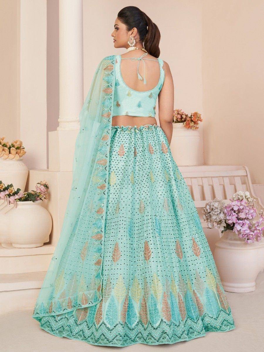 Mint green designer lehenga choli with leaf embroidery and sheer dupatta, perfect for Indian ethnic occasions