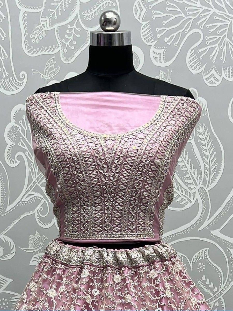 Pink embroidered lehenga choli with silver zari work, perfect for Indian ethnic wear occasions