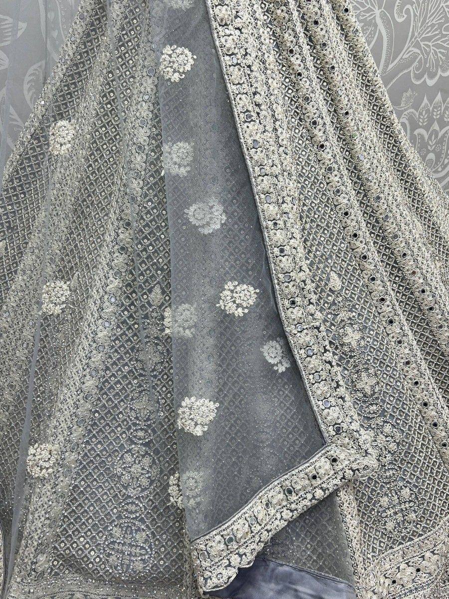 Grey embroidered lehenga choli with floral motifs and sequin detailing, perfect for Indian ethnic wear