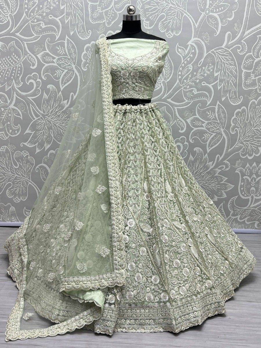 Mint green embroidered lehenga choli with matching dupatta, perfect for Indian weddings and festive occasions.