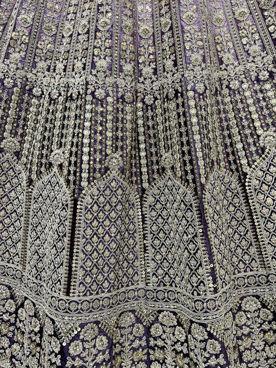 Purple designer lehenga with intricate gold embroidery and sequin detailing for Indian ethnic wear