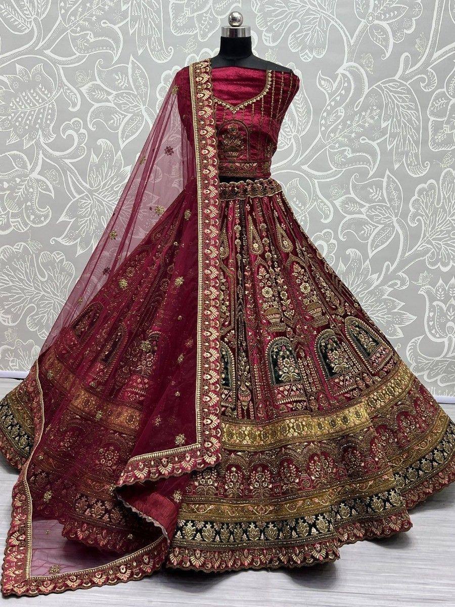 Maroon designer lehenga choli with gold embroidery and net dupatta, ethnic Indian wedding wear