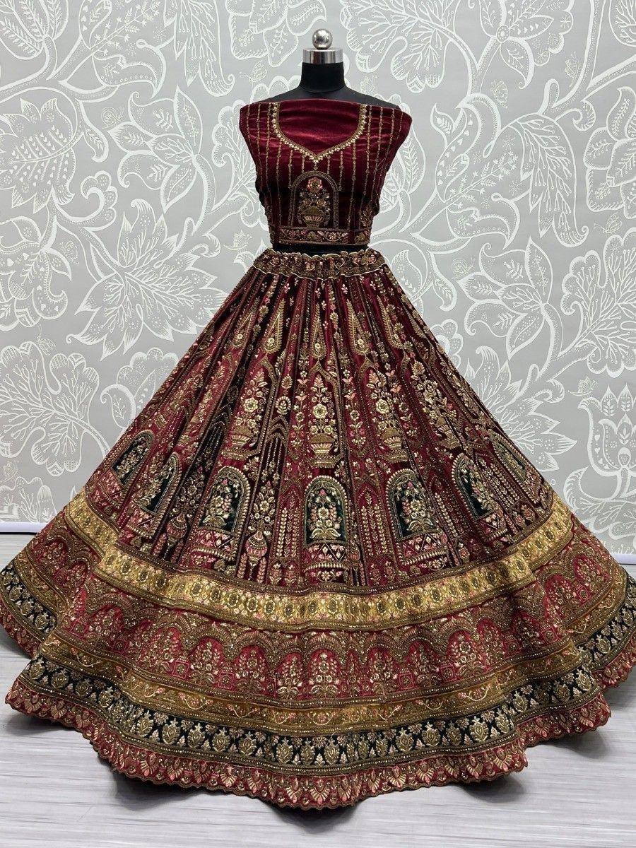 Maroon velvet lehenga choli with gold embroidery, perfect for Indian weddings and festive occasions
