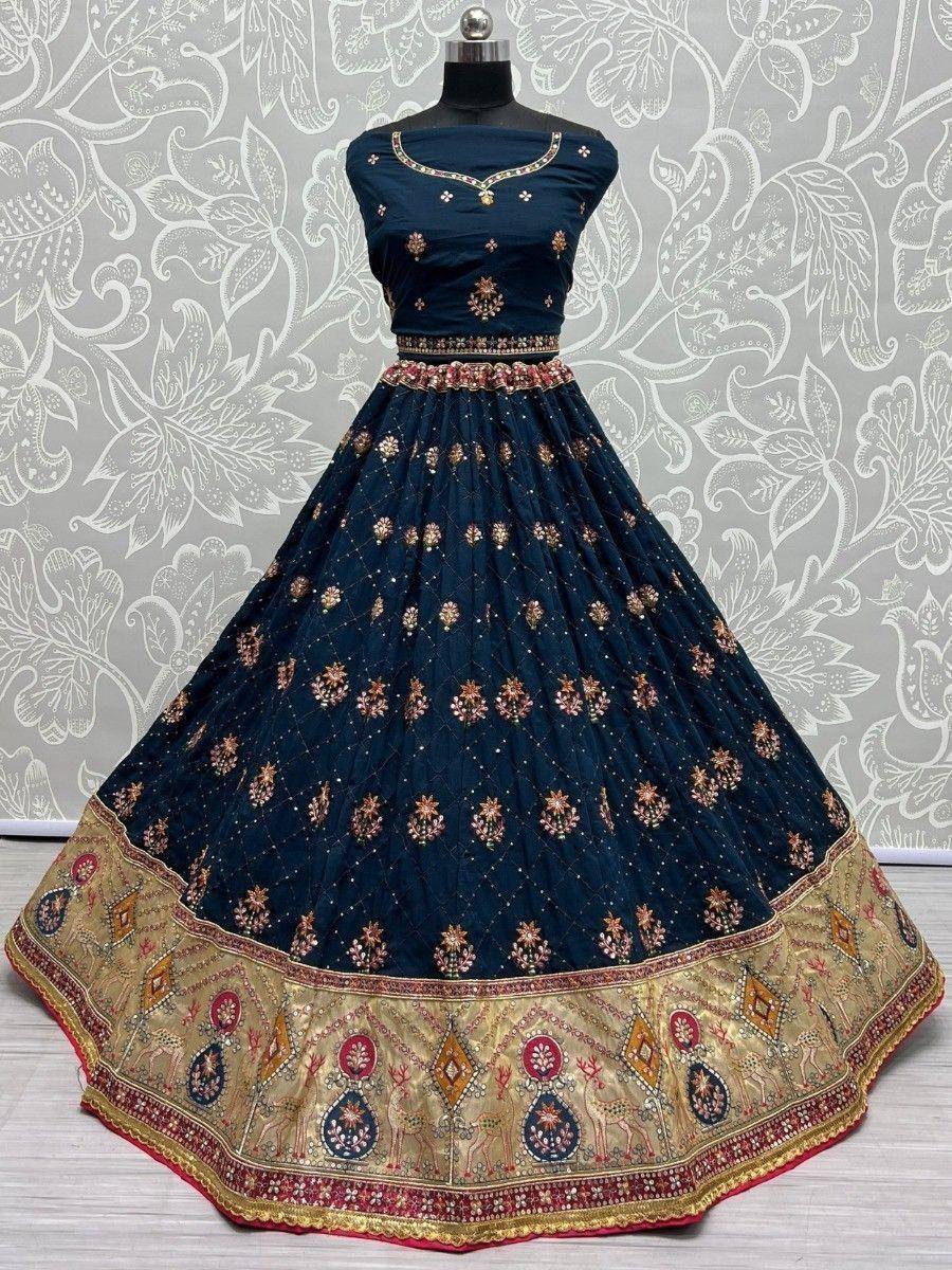 Navy blue designer lehenga choli with gold embroidery and deer motifs, perfect for Indian ethnic wear occasions