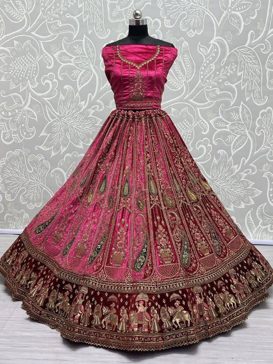 Pink and maroon designer lehenga choli with gold embroidery, perfect for Indian weddings and festive occasions.