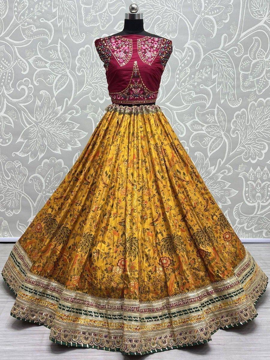 Maroon embroidered blouse with yellow floral lehenga, ethnic Indian wear for weddings and festivals