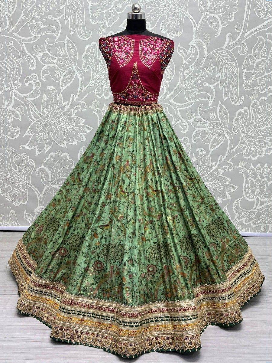 Green printed lehenga with maroon embroidered blouse, ethnic Indian wear for weddings and festivals