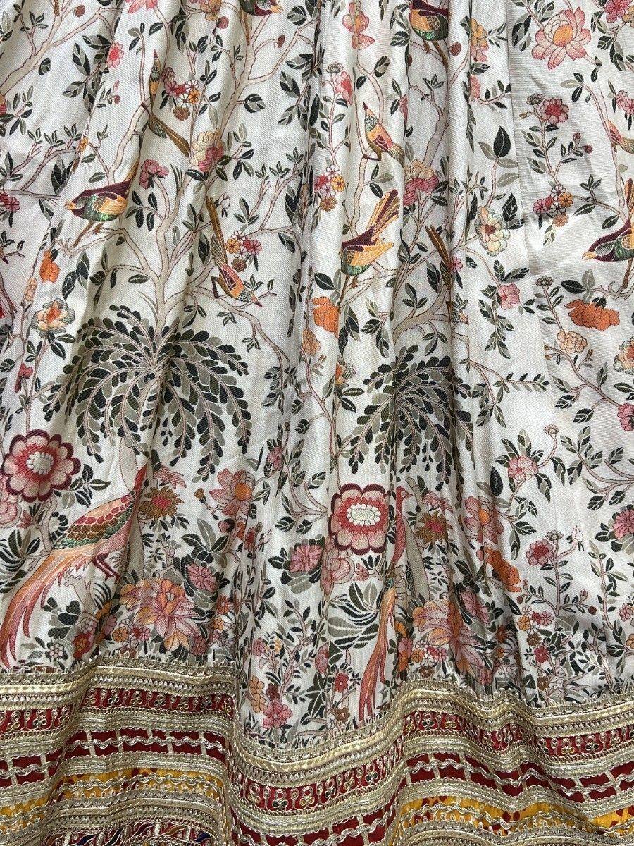 Floral and bird printed ethnic lehenga skirt with embroidered border, perfect for Indian weddings and festive occasions.