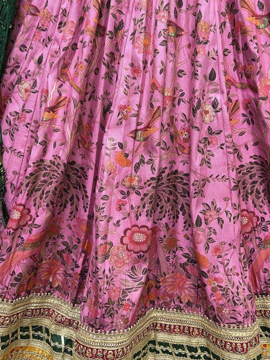 Pink floral and bird print lehenga skirt with gold embroidery border
