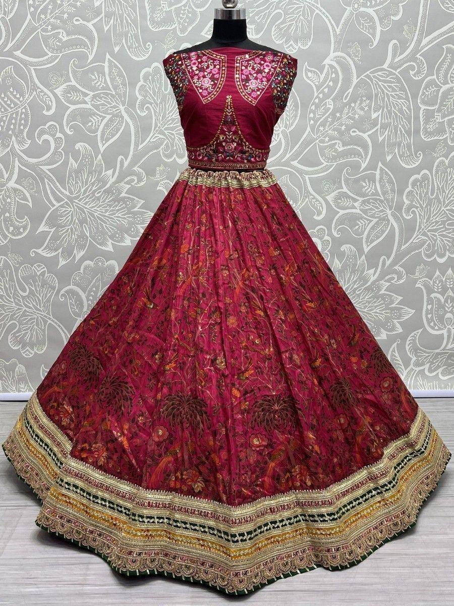 Maroon embroidered lehenga choli with floral print and gold border, ethnic Indian wear
