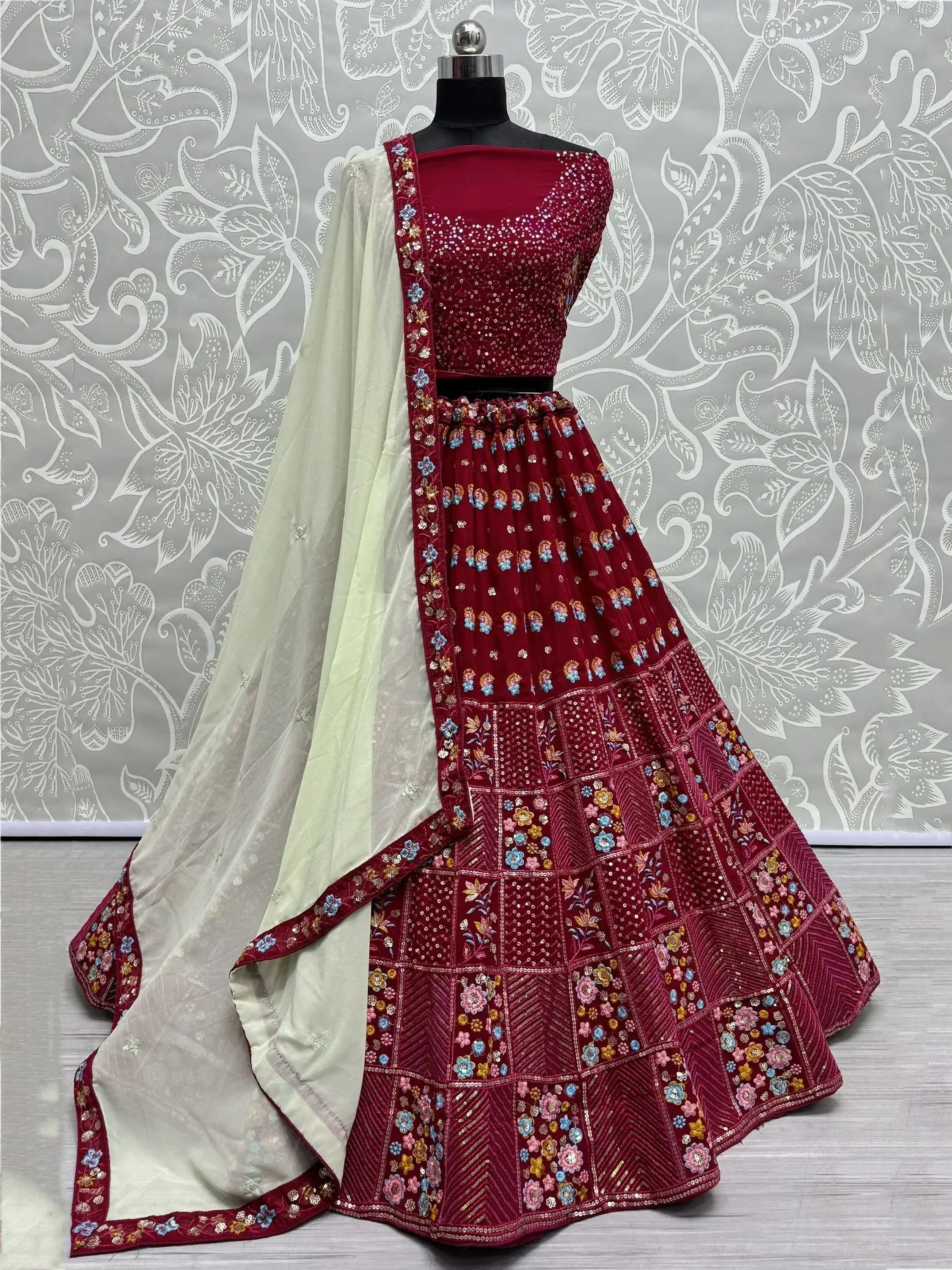 Maroon embroidered lehenga choli with floral motifs and sheer dupatta, Indian ethnic wear