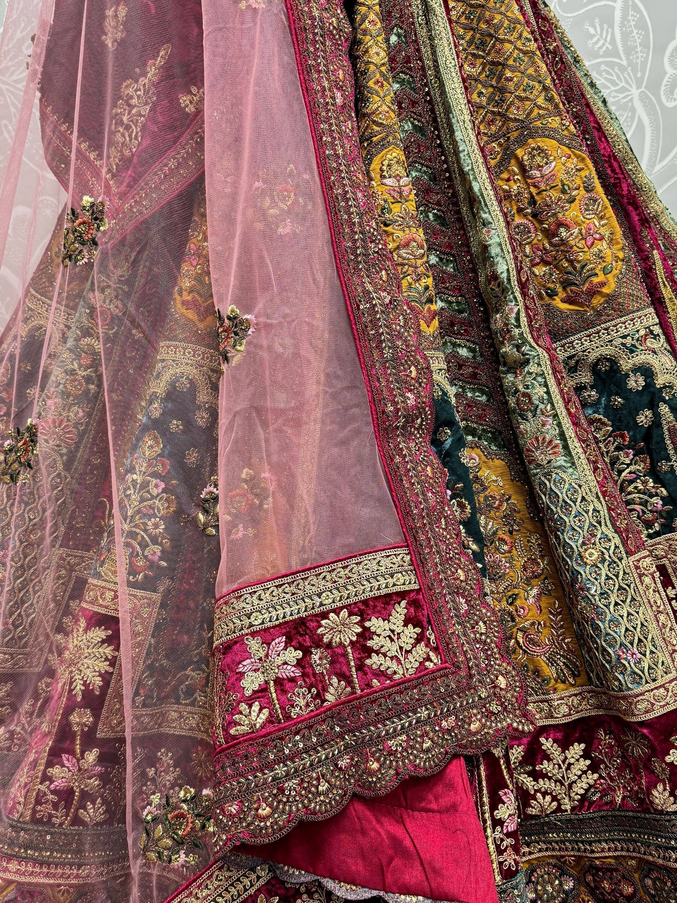 Luxury Indian lehenga choli with heavy embroidery, velvet fabric, and sheer dupatta for weddings and festivals