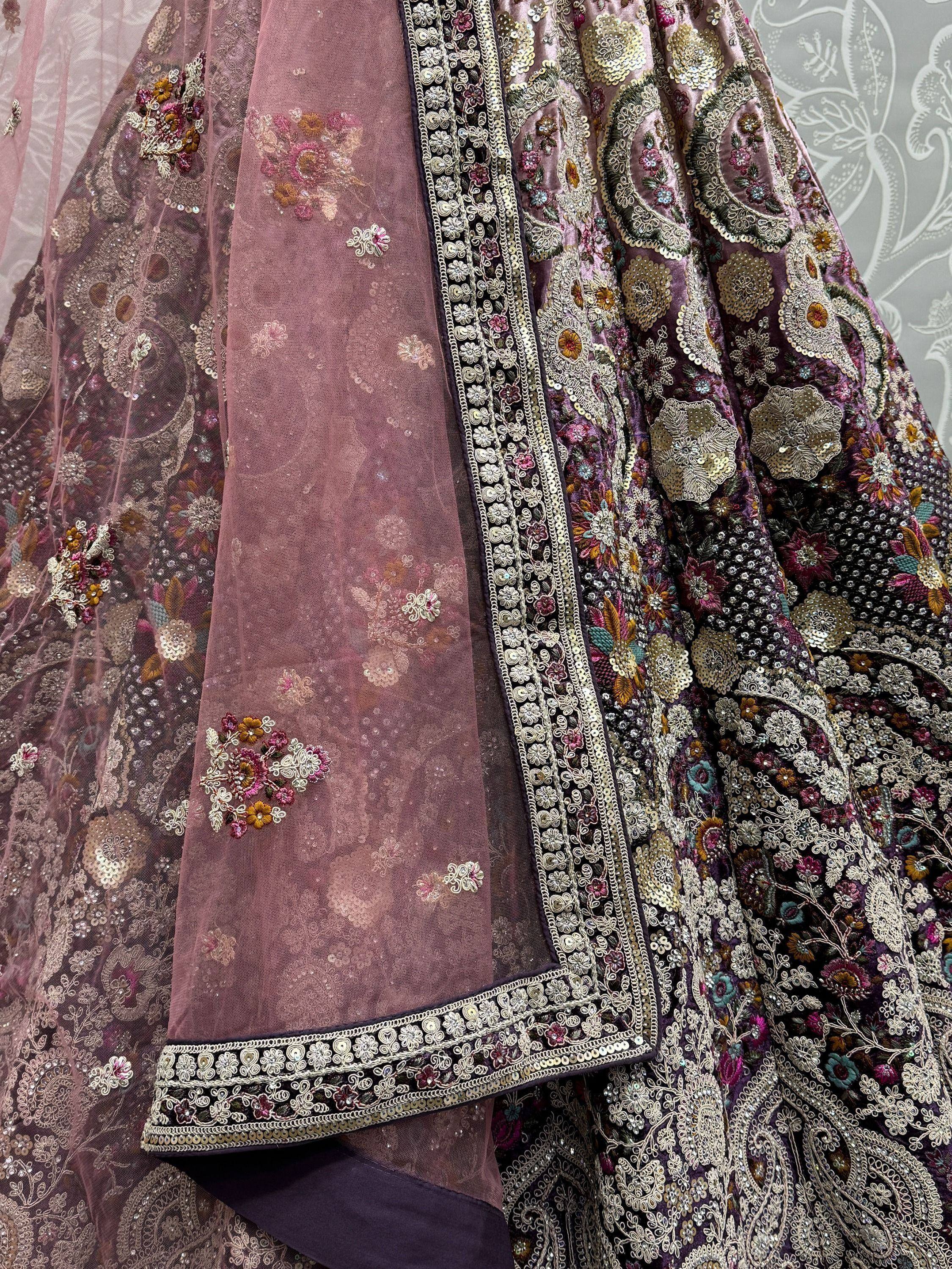 Elegant purple lehenga choli with intricate floral embroidery and sequin work, perfect for Indian ethnic wear.