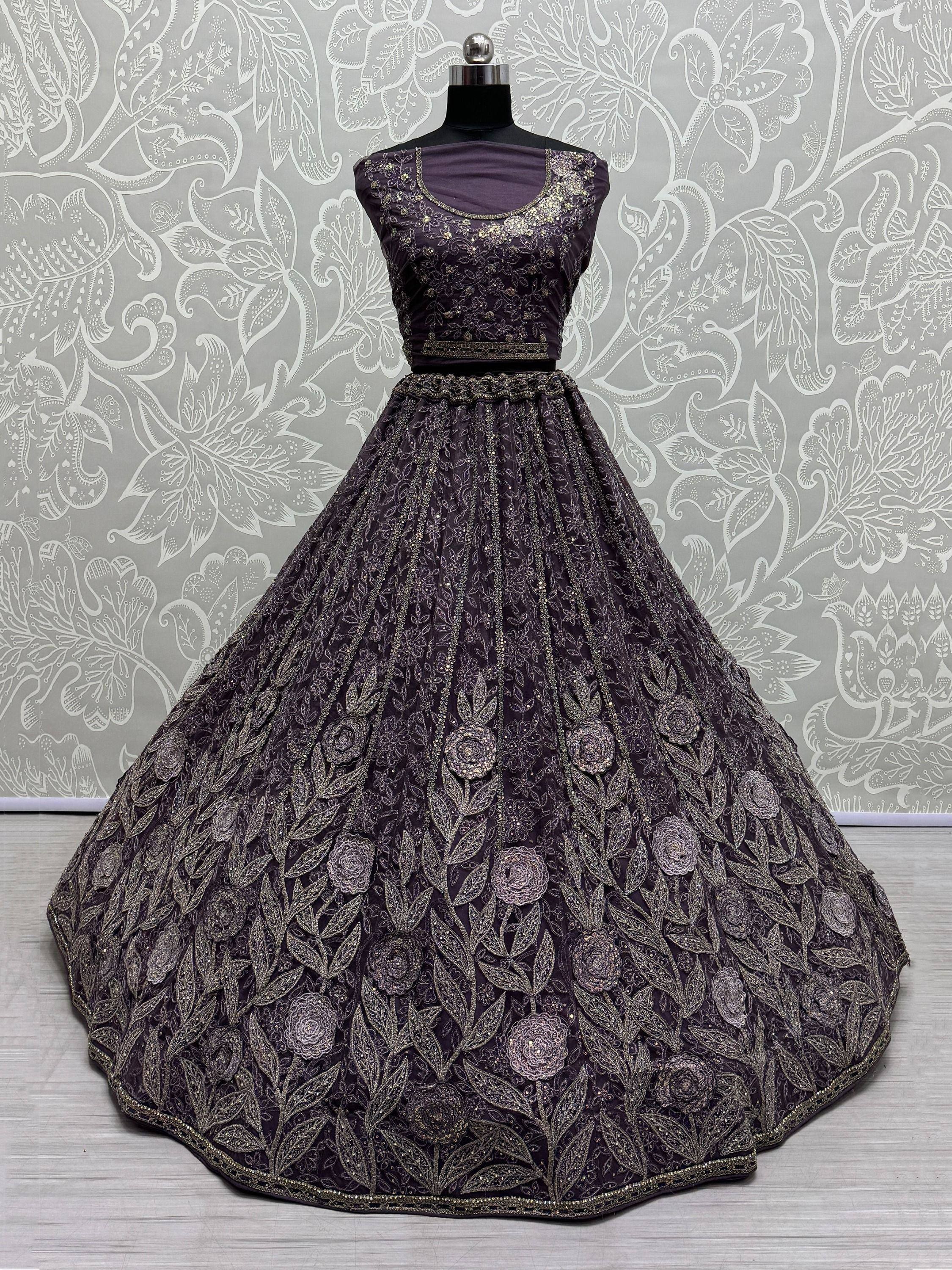 Purple designer lehenga choli with gold floral embroidery and embellished skirt for Indian ethnic wear
