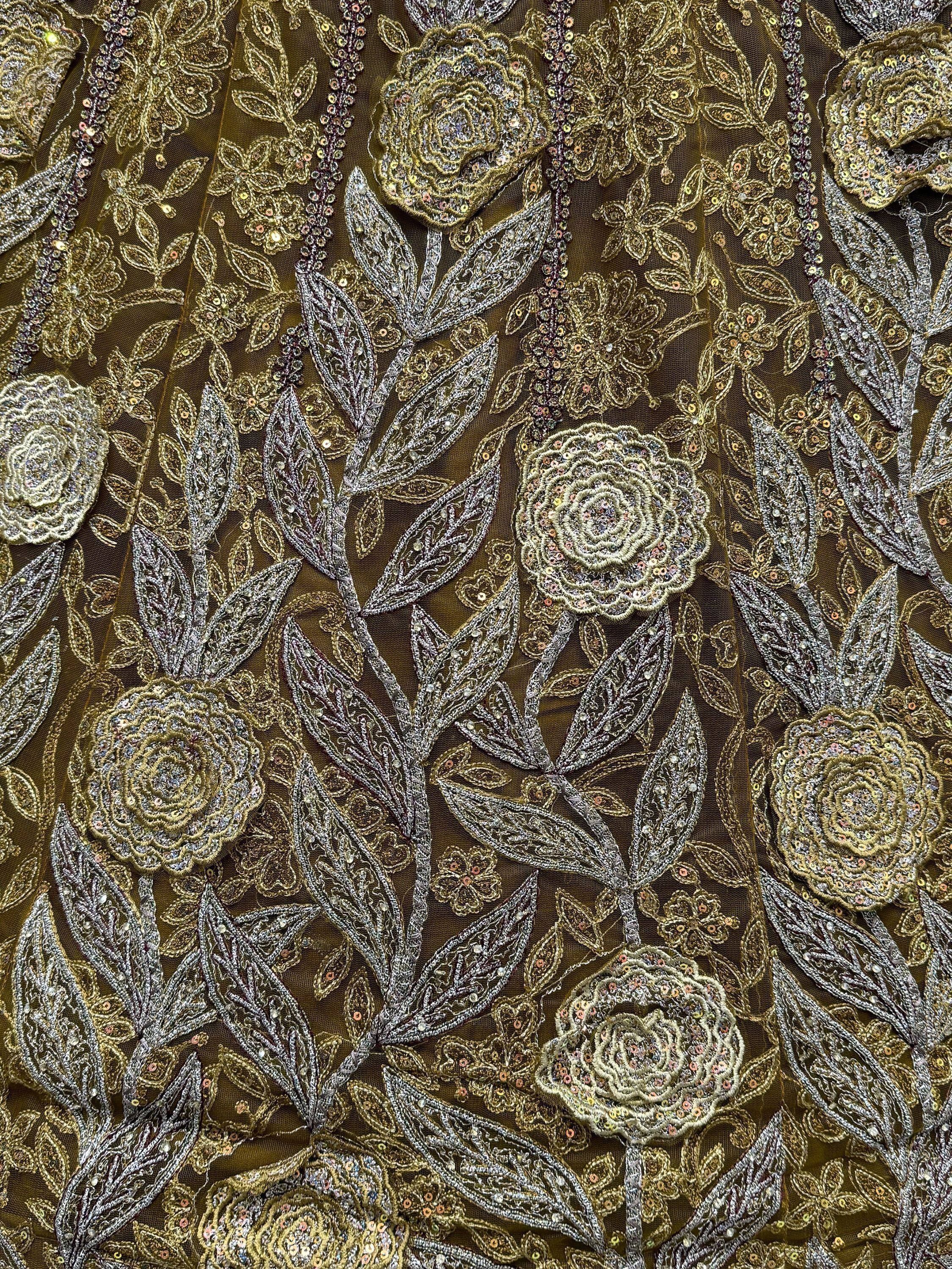 Gold and silver floral embroidery with sequins on sheer fabric for ethnic wear