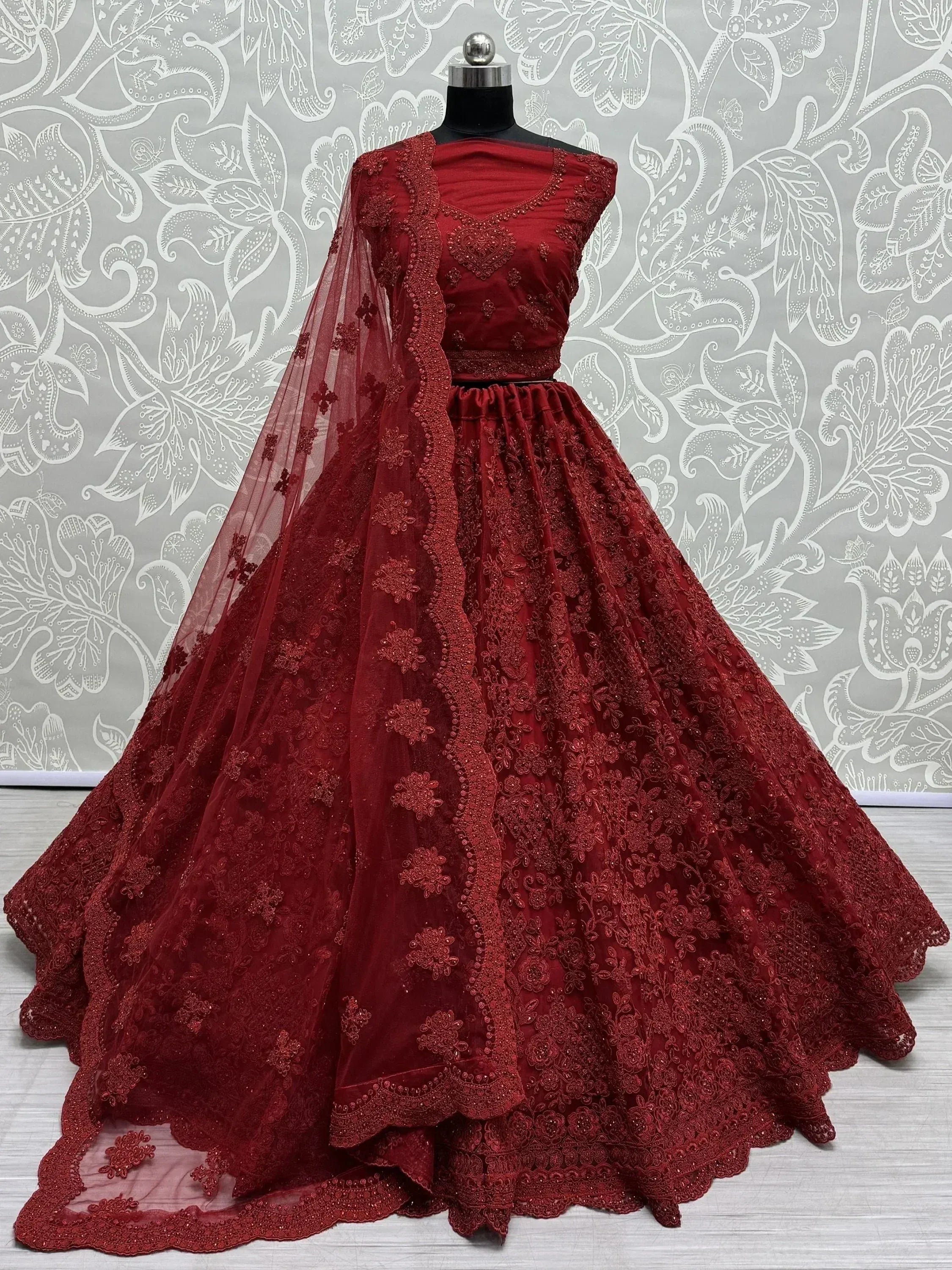 Red embroidered lehenga choli with net dupatta, Indian ethnic wear for weddings and parties