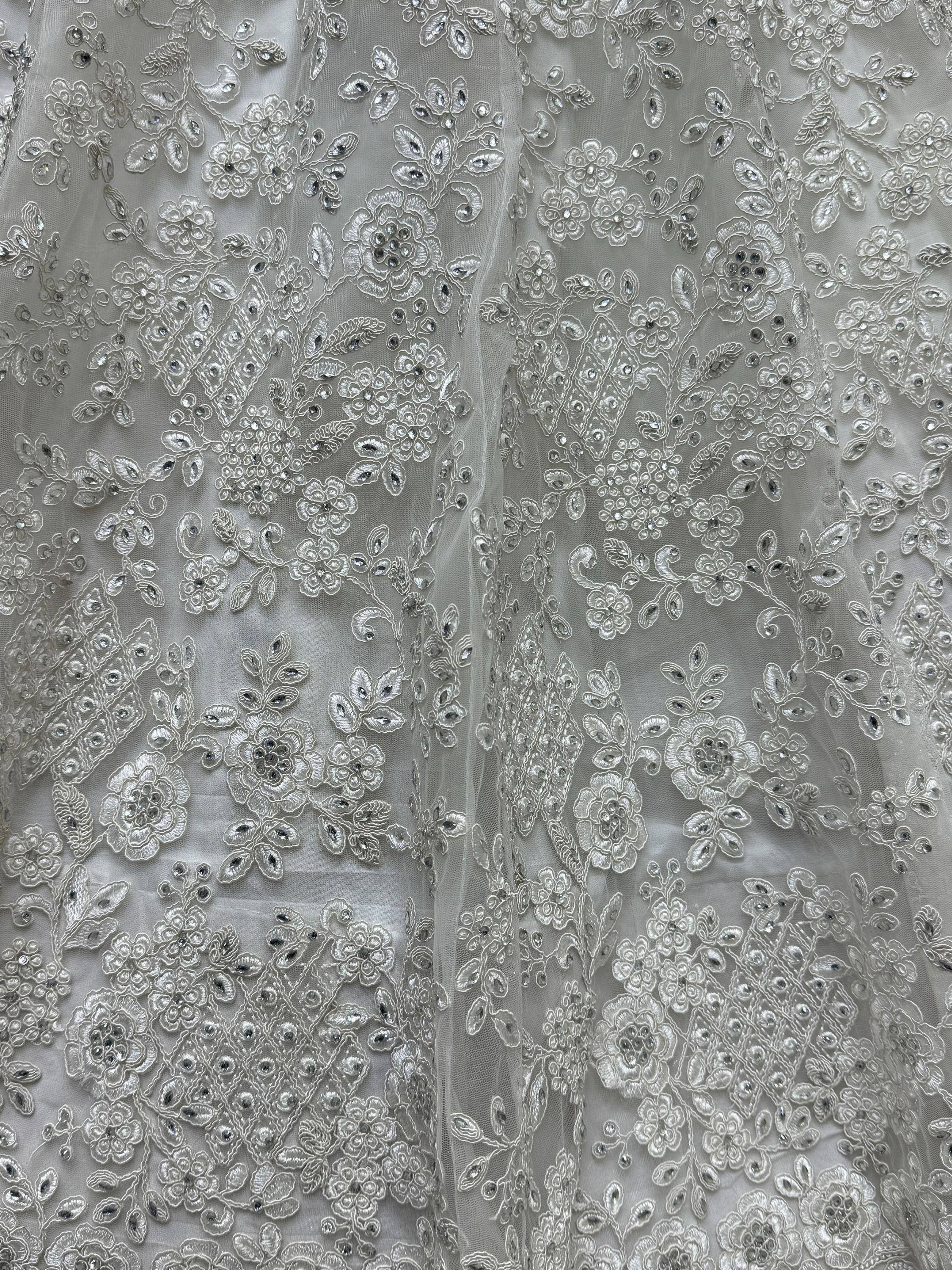 Elegant silver floral embroidery with sequins on sheer fabric for designer ethnic wear