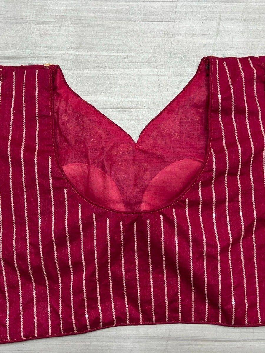 Maroon ethnic blouse with white vertical stripes and sheer neckline, ideal for lehenga choli or saree