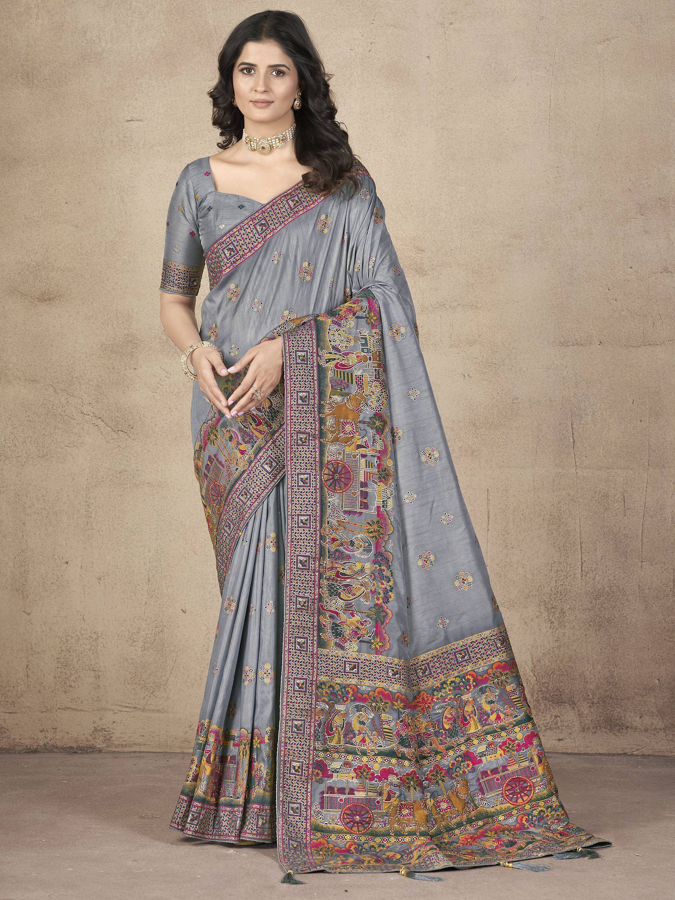 Grey designer saree with intricate ethnic print and border, perfect for Indian occasions