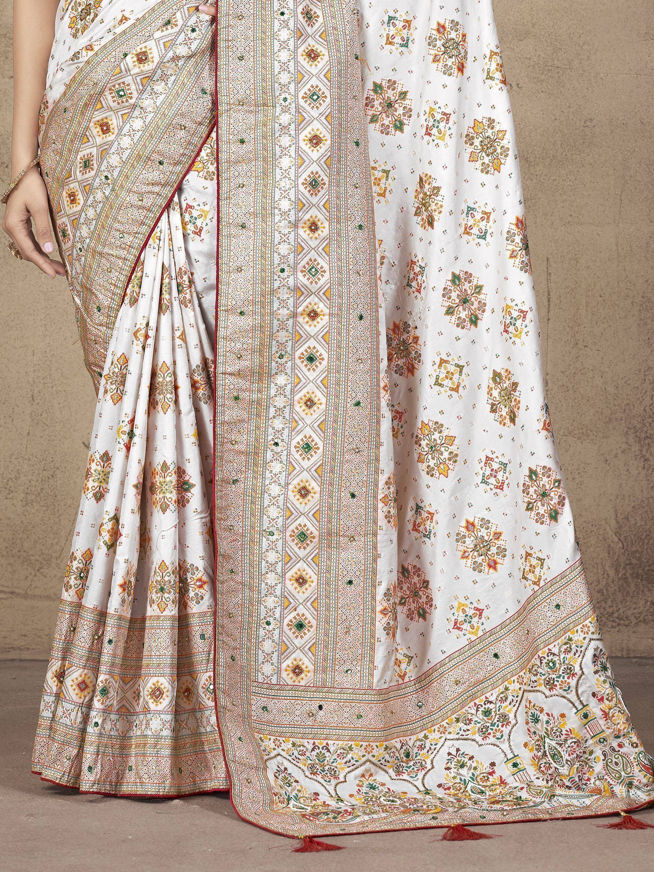 White floral printed saree with intricate border, ethnic Indian wear for women