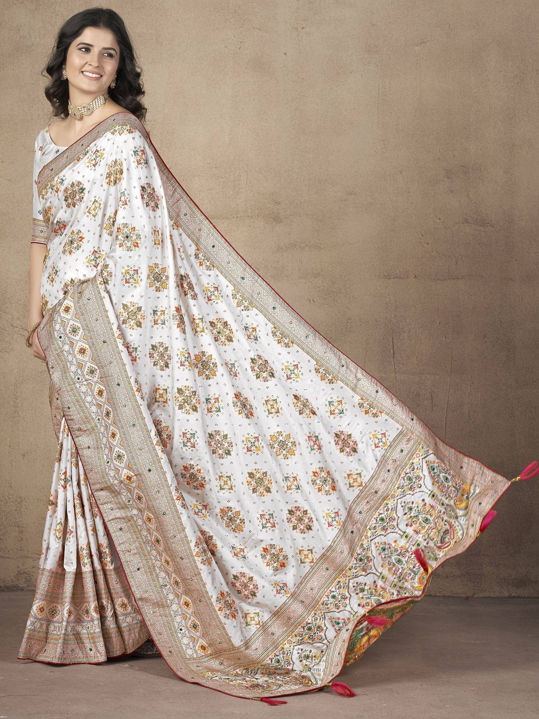 White floral printed saree with intricate border, ethnic Indian wear for women