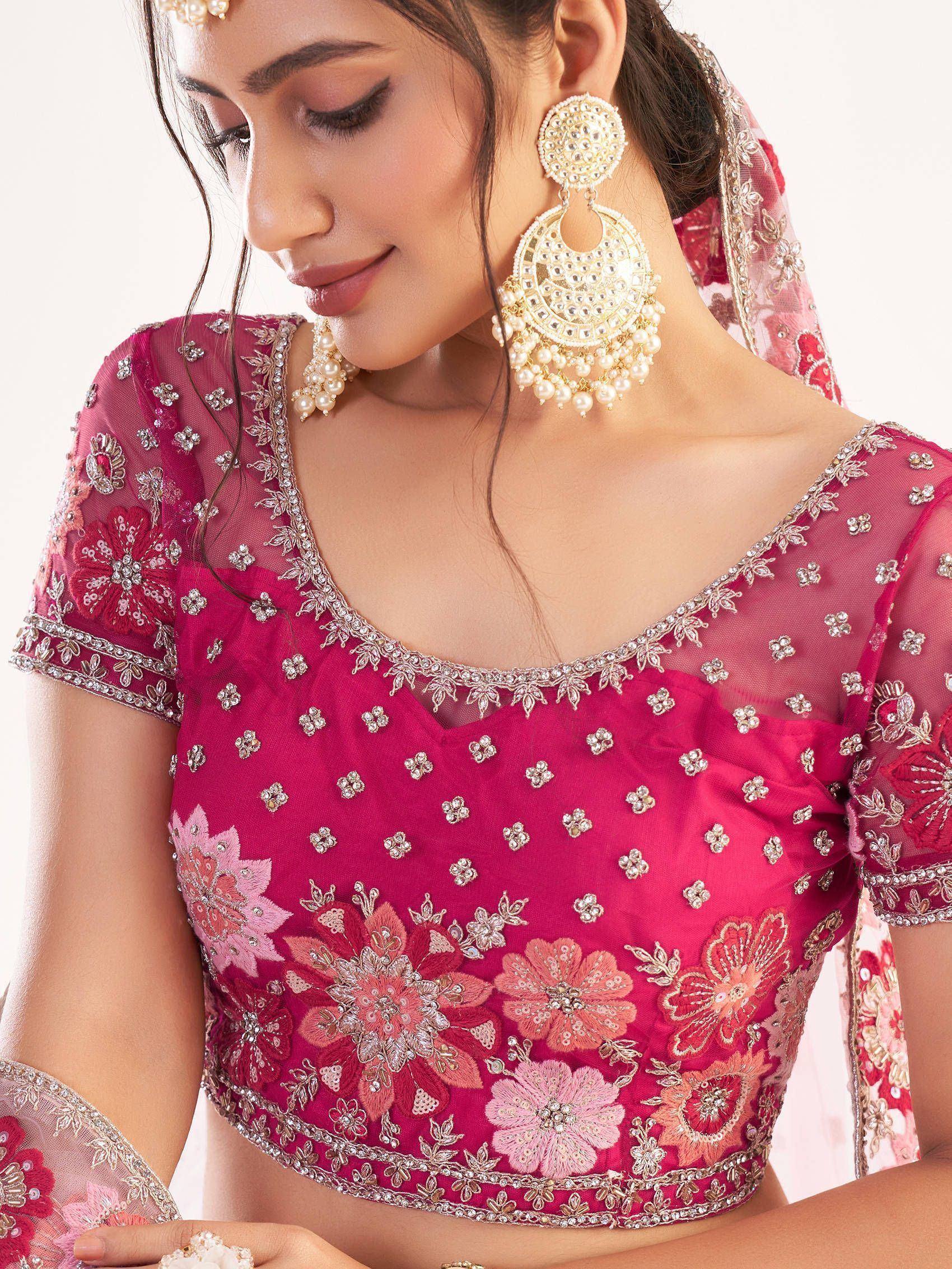 Pink floral embroidered lehenga choli blouse with gold jewelry and dupatta