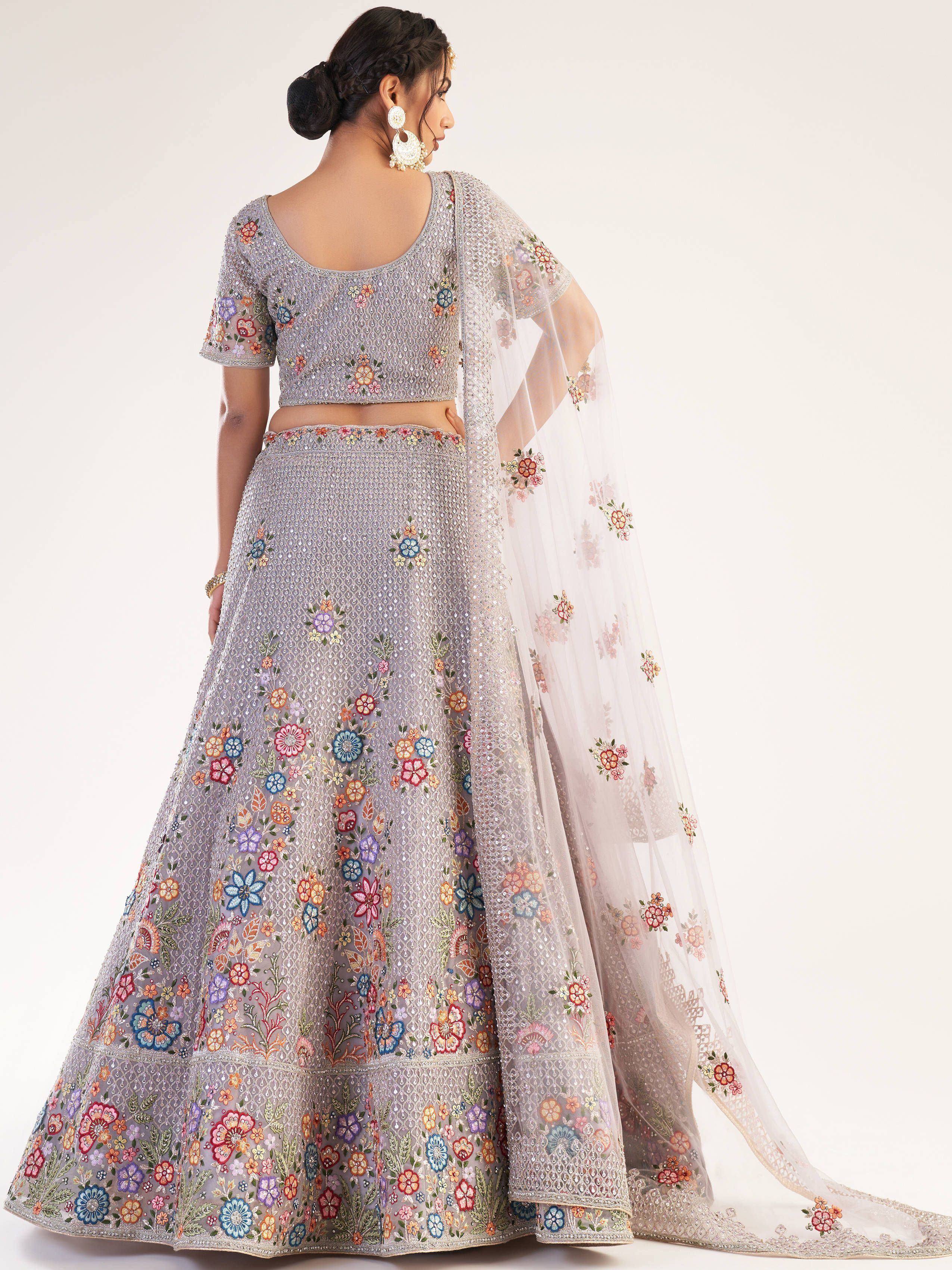 Elegant floral embroidered lehenga choli with sheer dupatta, perfect for Indian ethnic wear
