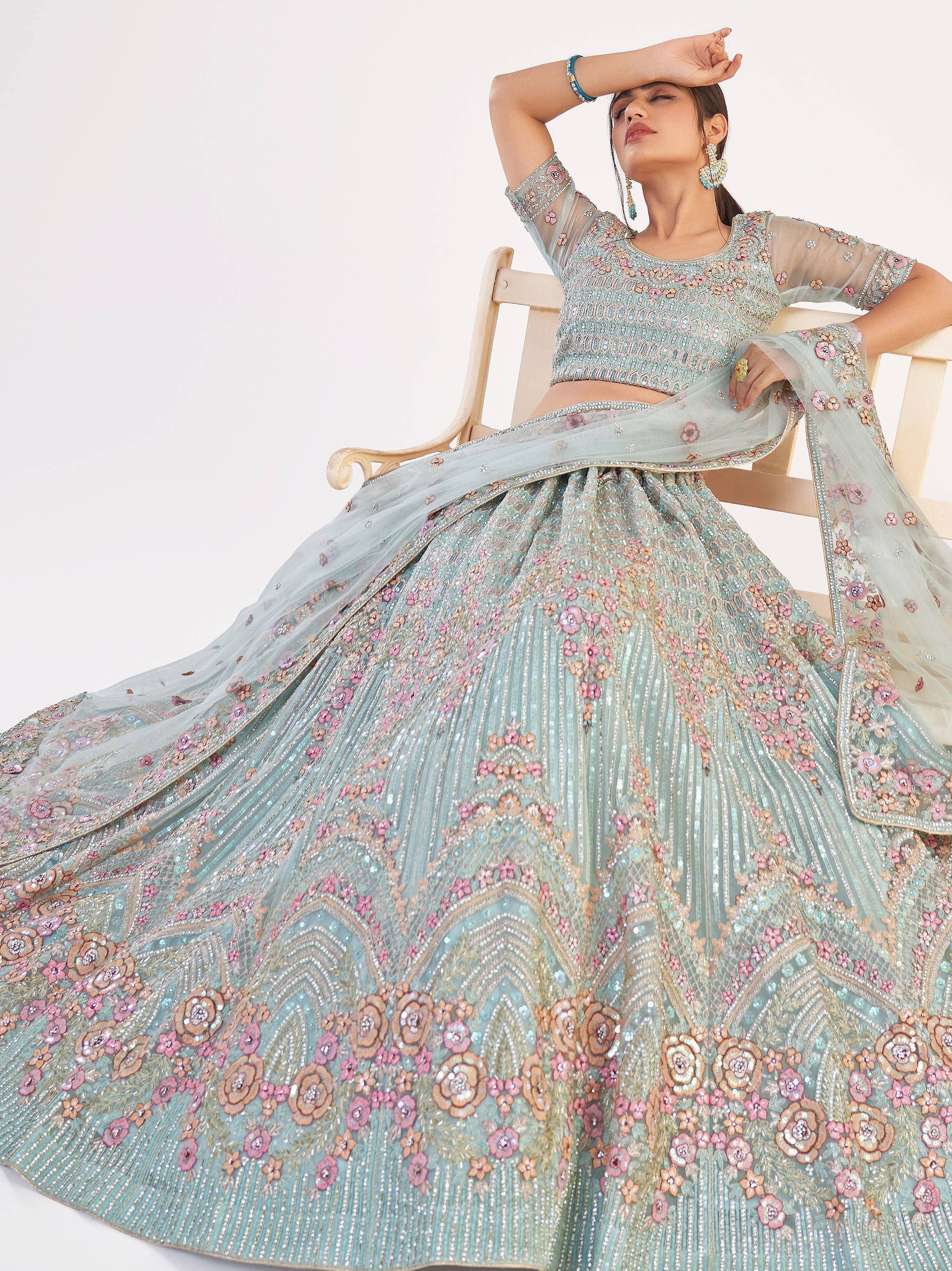 Elegant light blue lehenga choli with floral embroidery and sequins for Indian ethnic wear