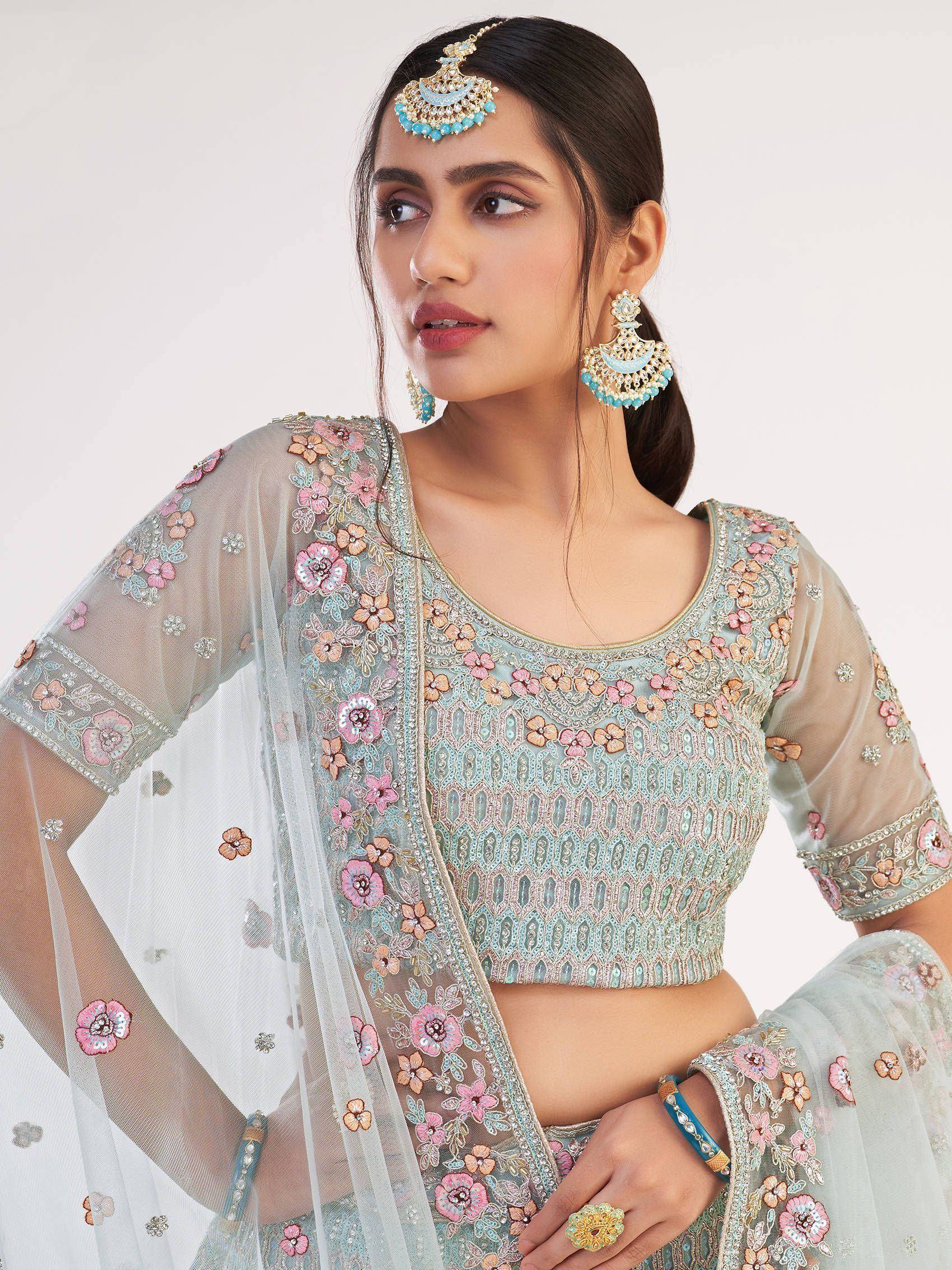 Elegant floral embroidered lehenga choli with pastel hues and intricate detailing