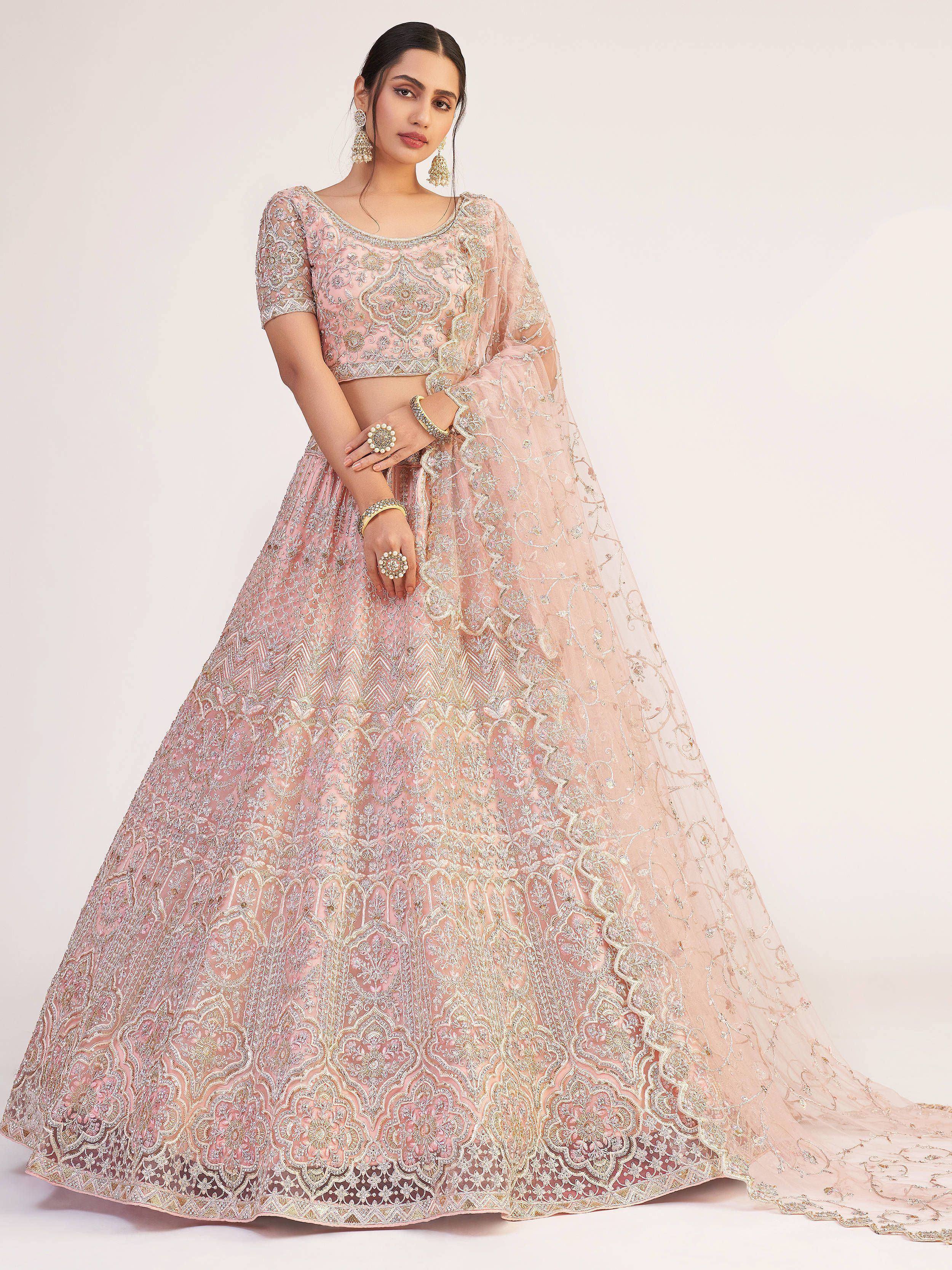 Pink embroidered lehenga choli with gold detailing, perfect for Indian weddings and festive occasions