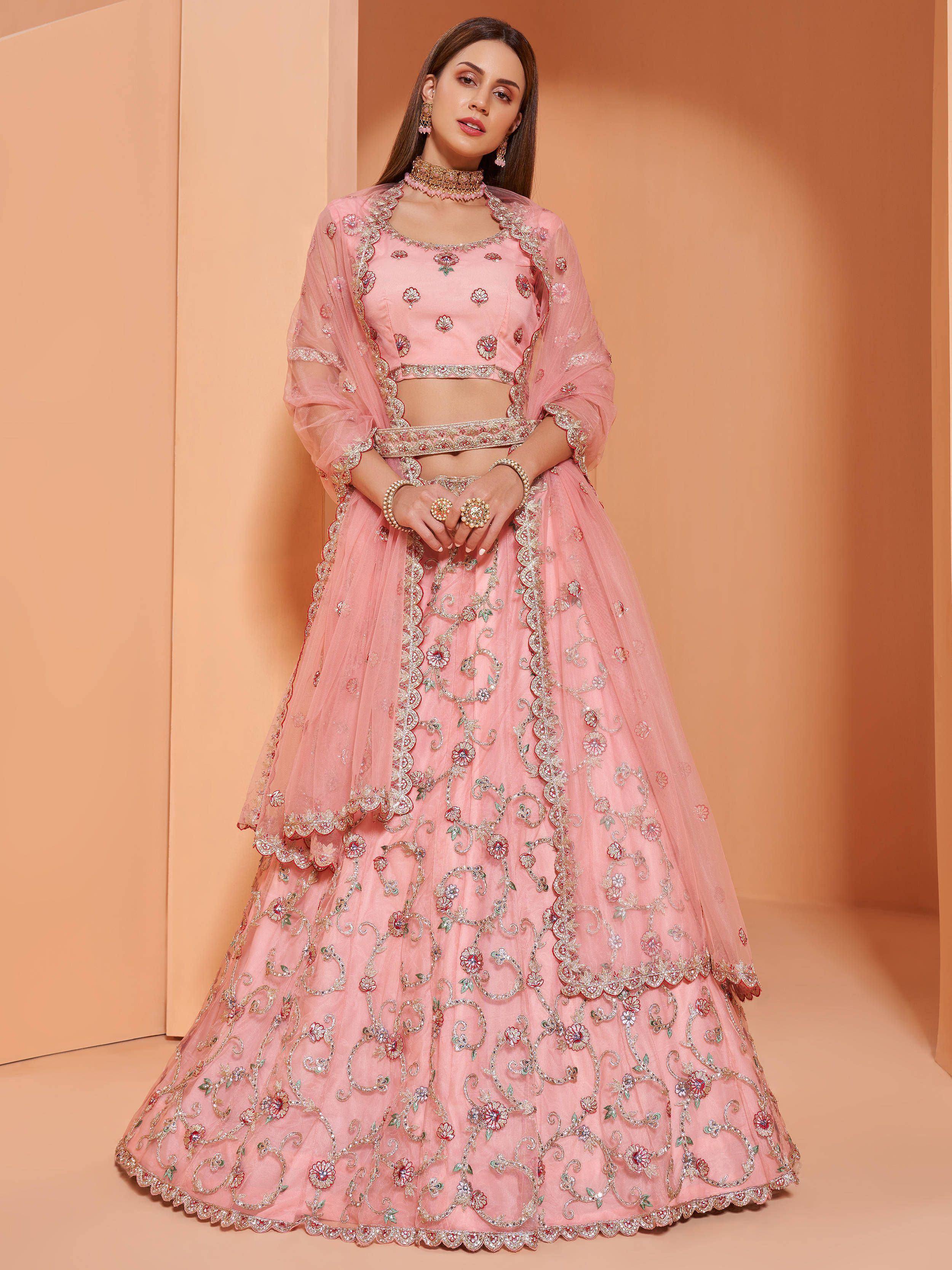 Pink embroidered lehenga choli with floral zari work, perfect for Indian weddings and festive occasions.