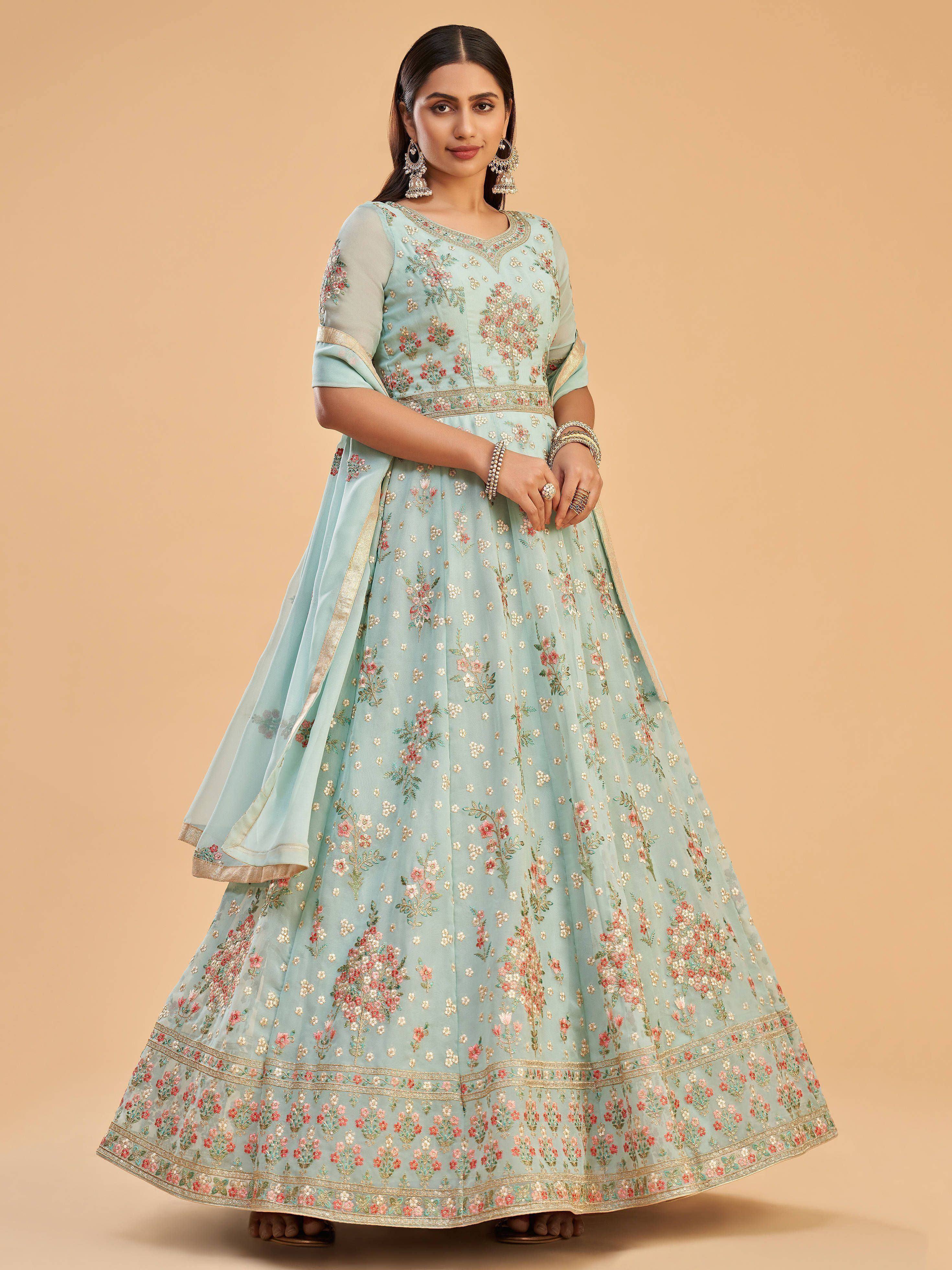 Light blue floral embroidered lehenga choli with gold detailing, perfect for ethnic occasions