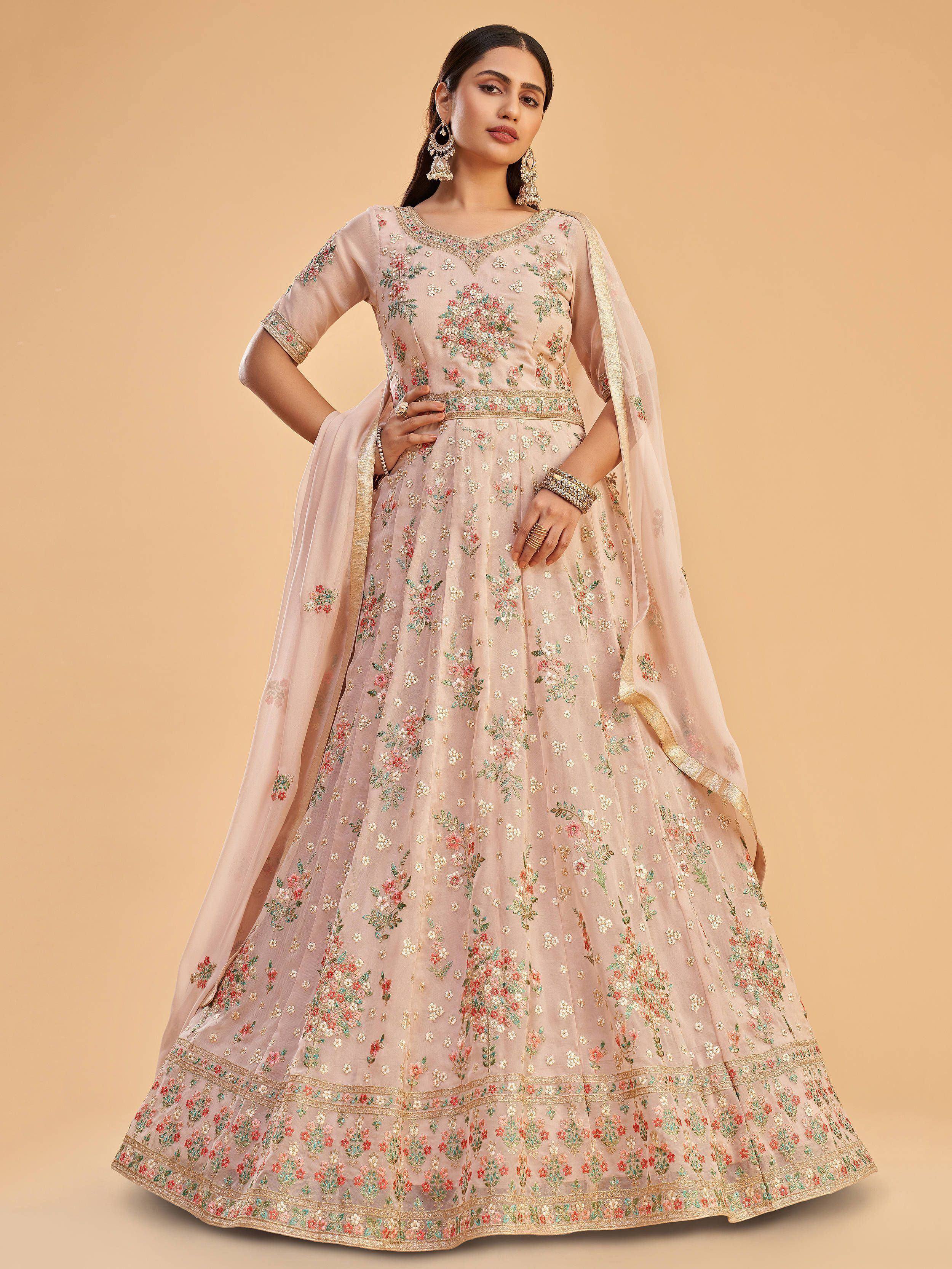 Elegant floral embroidered lehenga choli with golden accents and matching dupatta for Indian ethnic wear