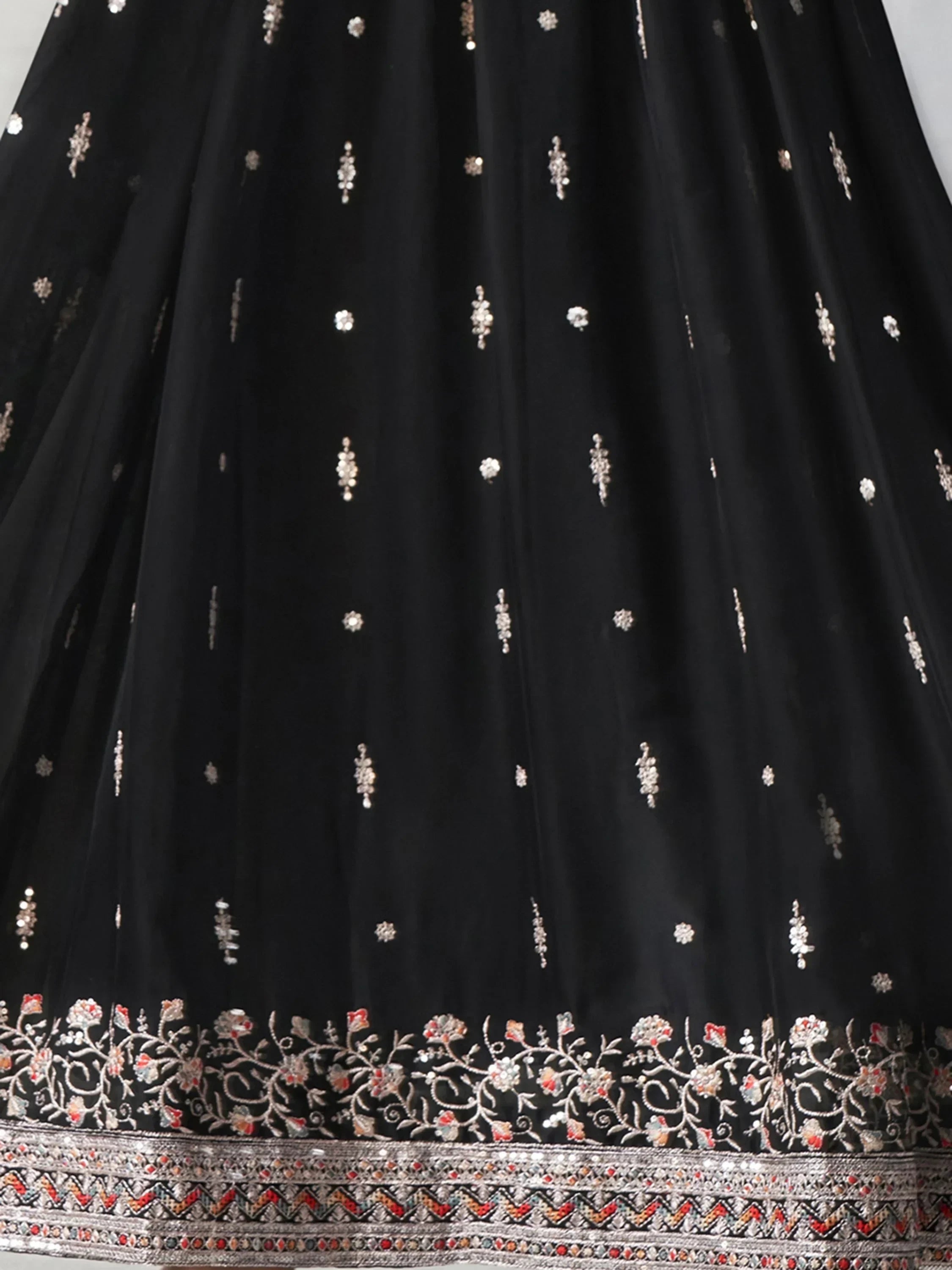 Black ethnic lehenga skirt with gold sequin butti and floral embroidered border