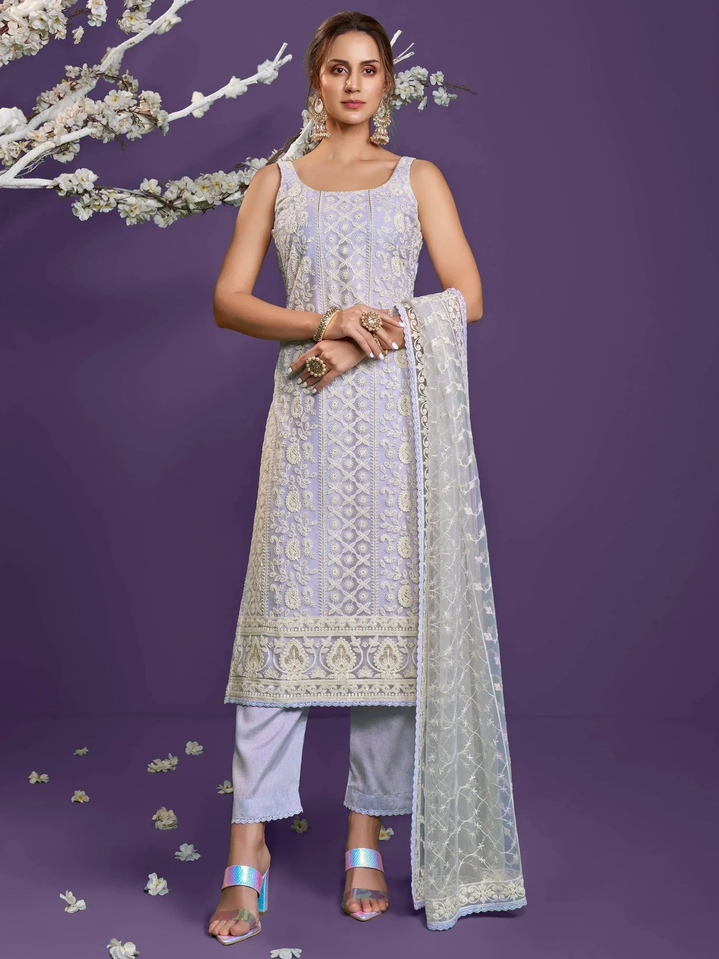 Lavender embroidered salwar kameez with matching dupatta, floral backdrop, ethnic wear
