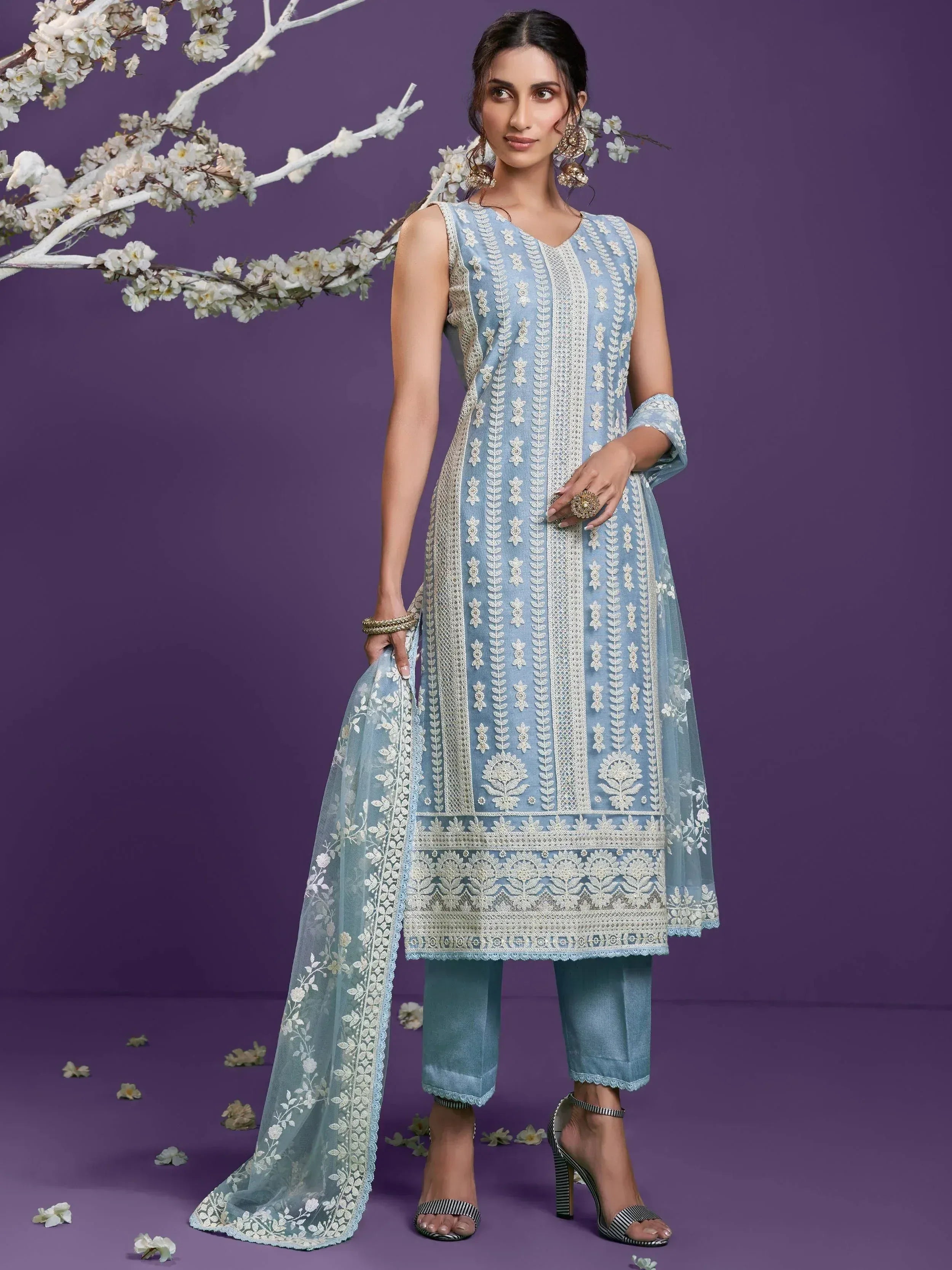 Light blue embroidered salwar kameez with floral dupatta, perfect for ethnic occasions
