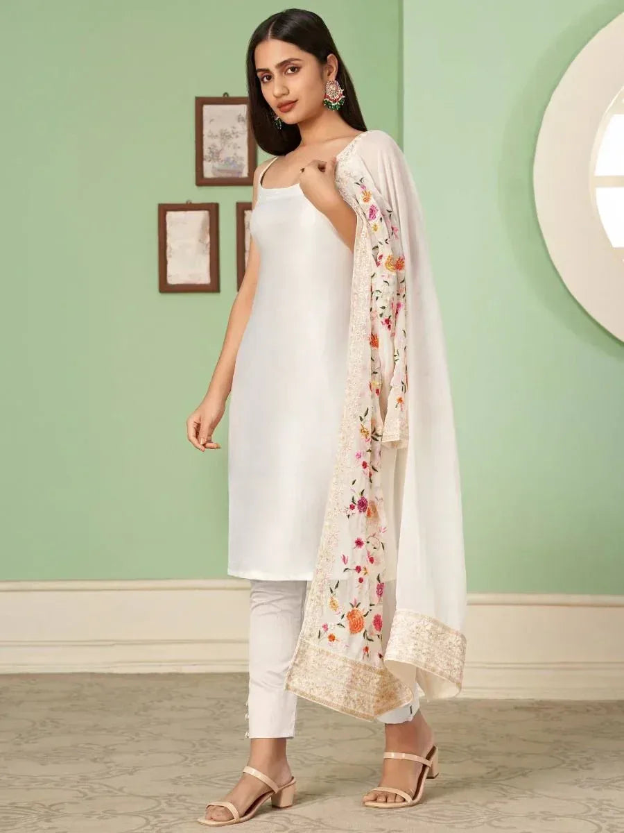 White embroidered dupatta with floral print paired with sleeveless kurta and pants, ethnic wear outfit